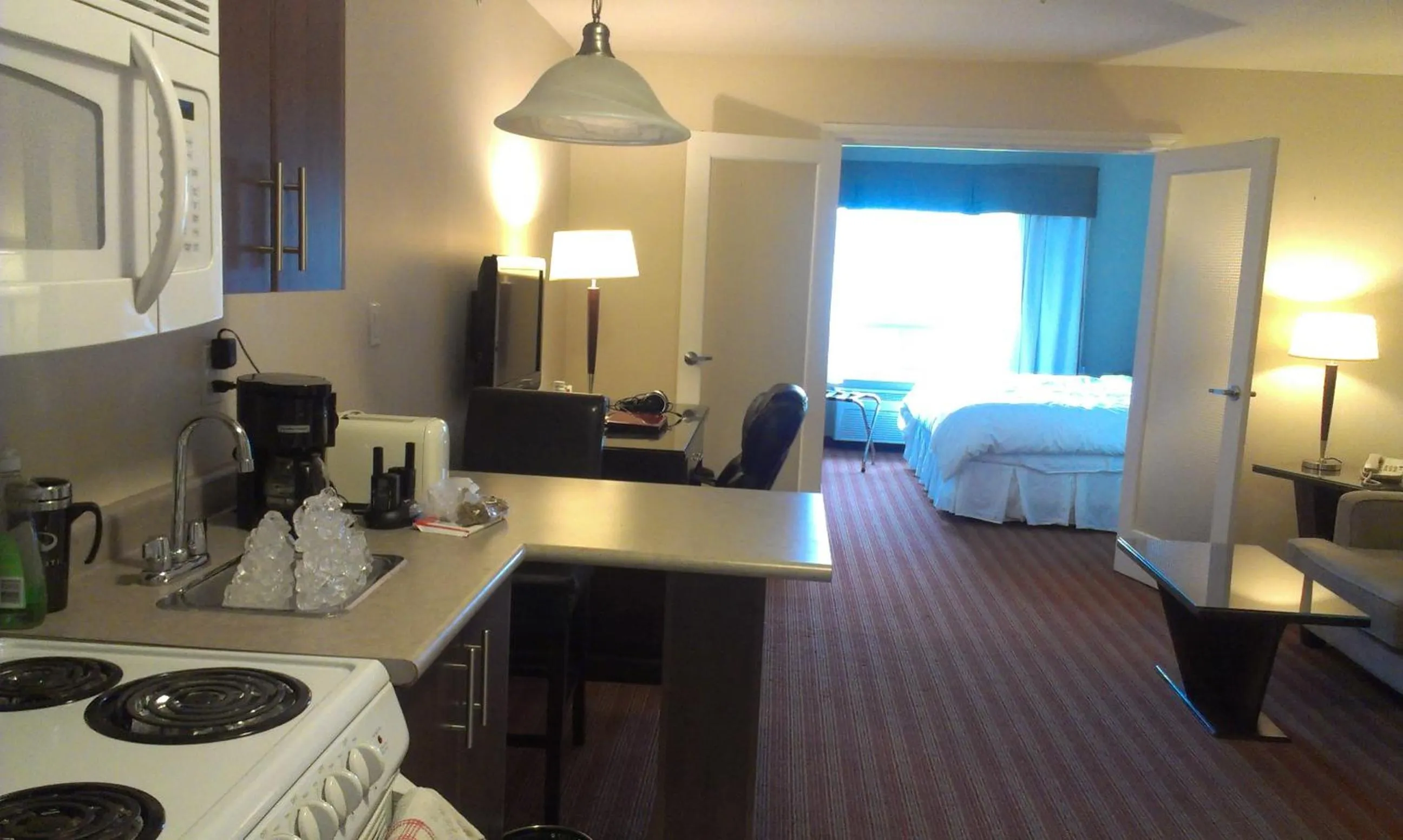 Photo of the whole room, Bed in Sigma Inn & Suites Hudson's Hope