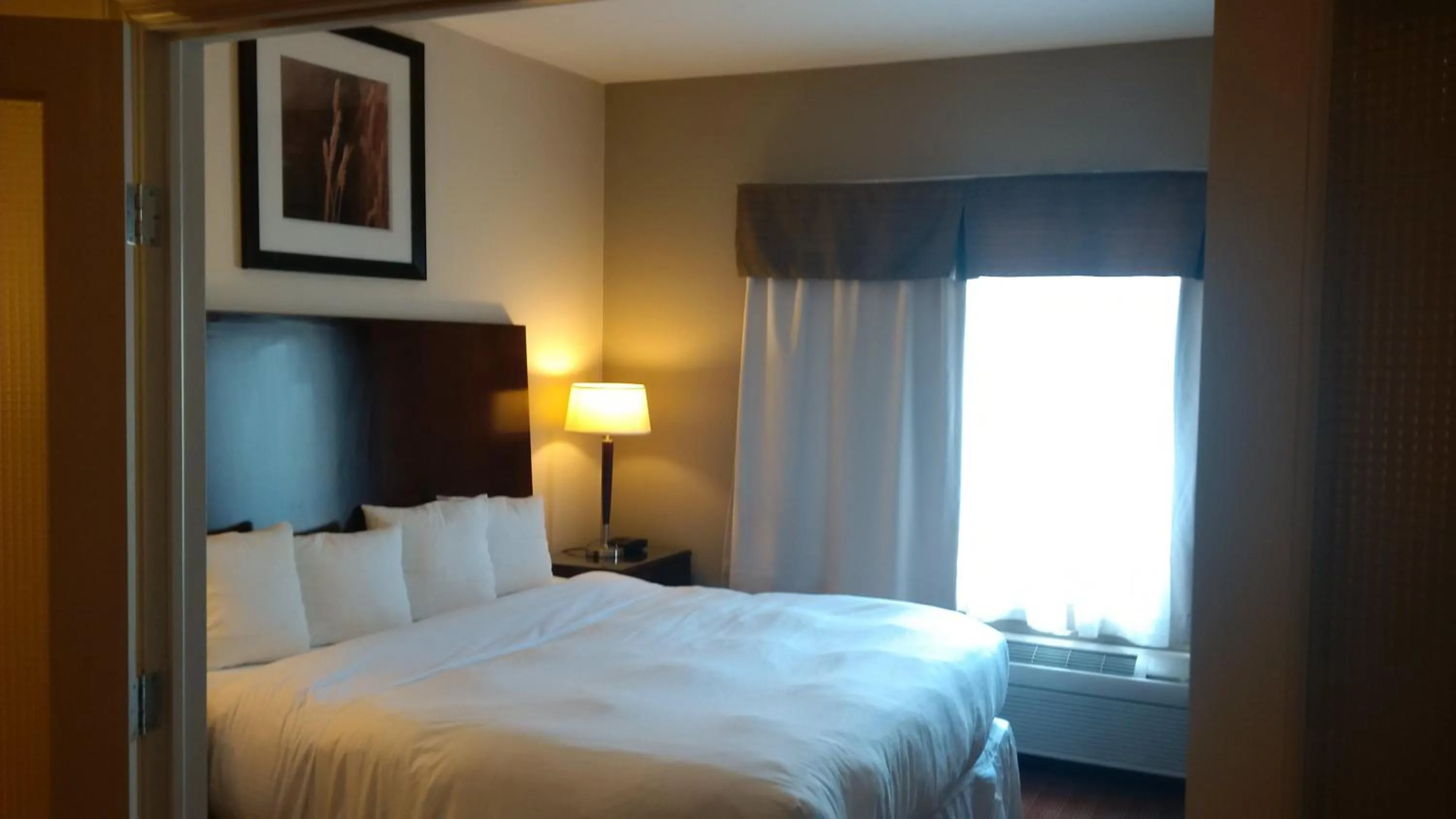 Bed in Sigma Inn & Suites Hudson's Hope