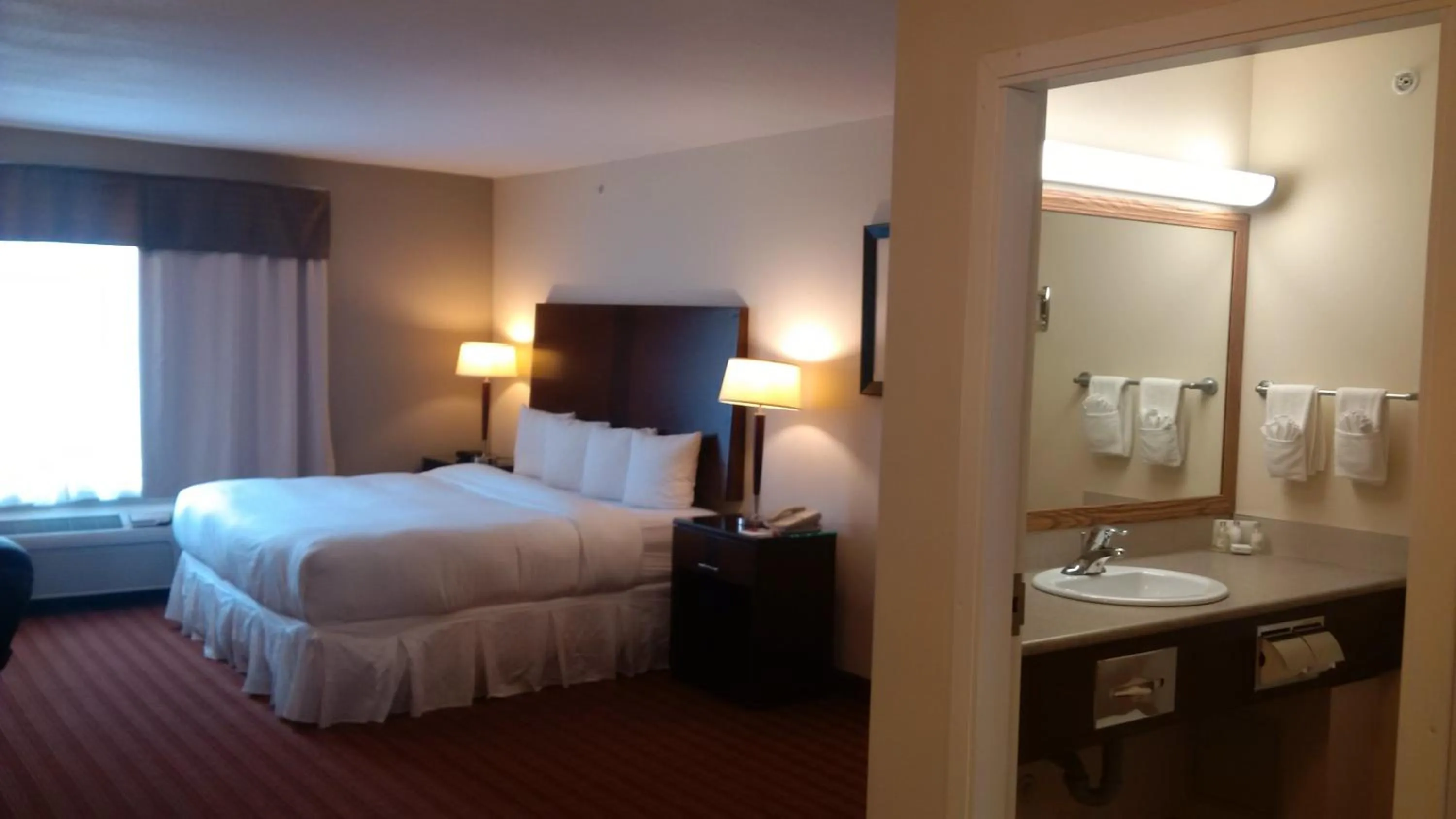 Bed in Sigma Inn & Suites Hudson's Hope