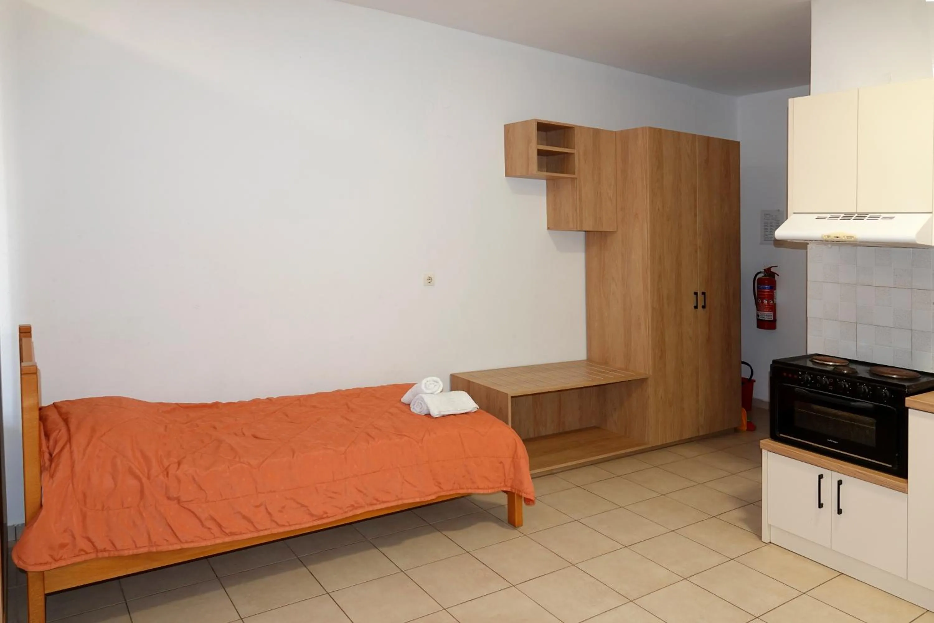 Bed in Aeriko Hotel Apartments