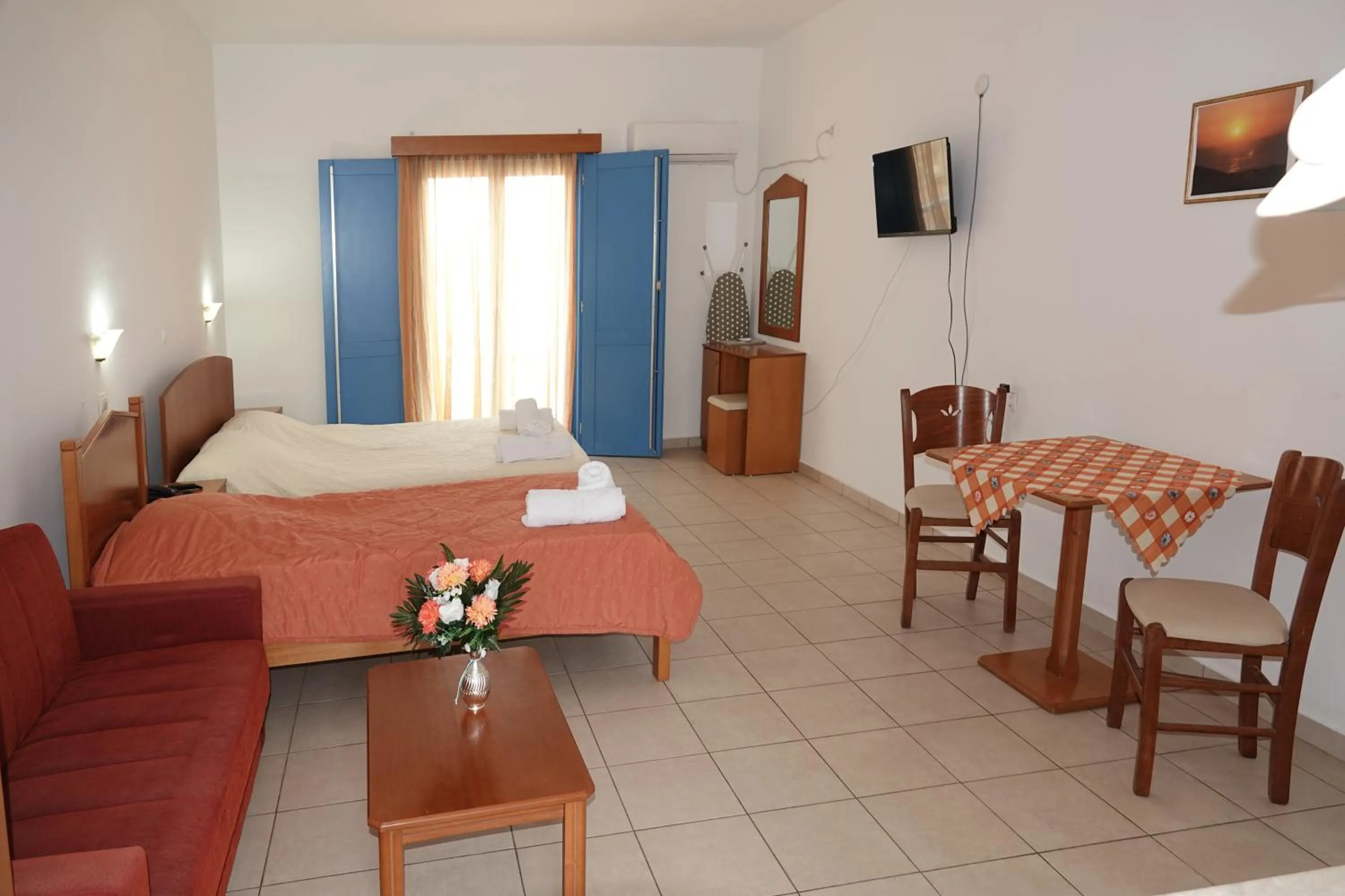 Bed in Aeriko Hotel Apartments