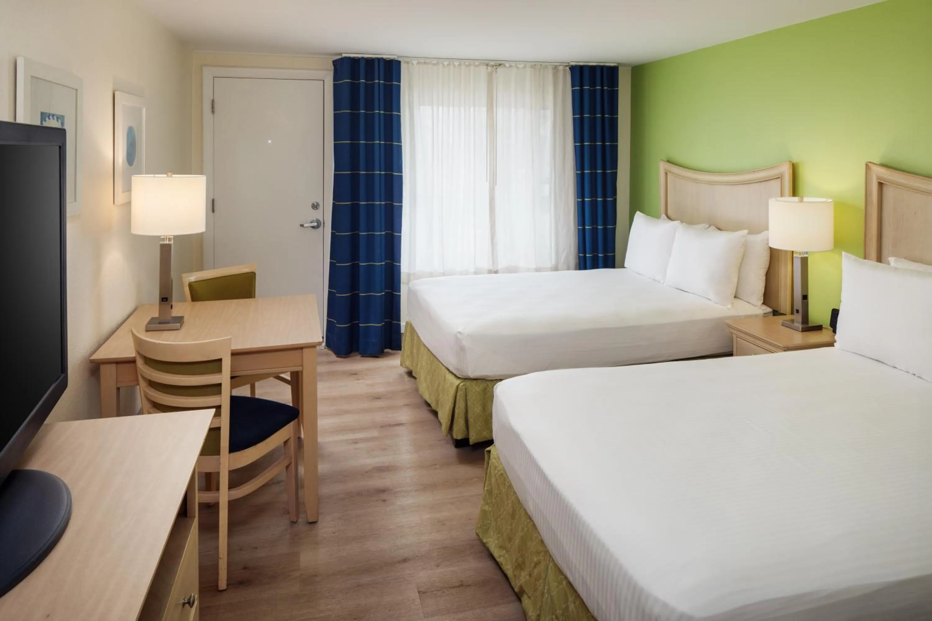 Bed in Surfside Hotel and Suites