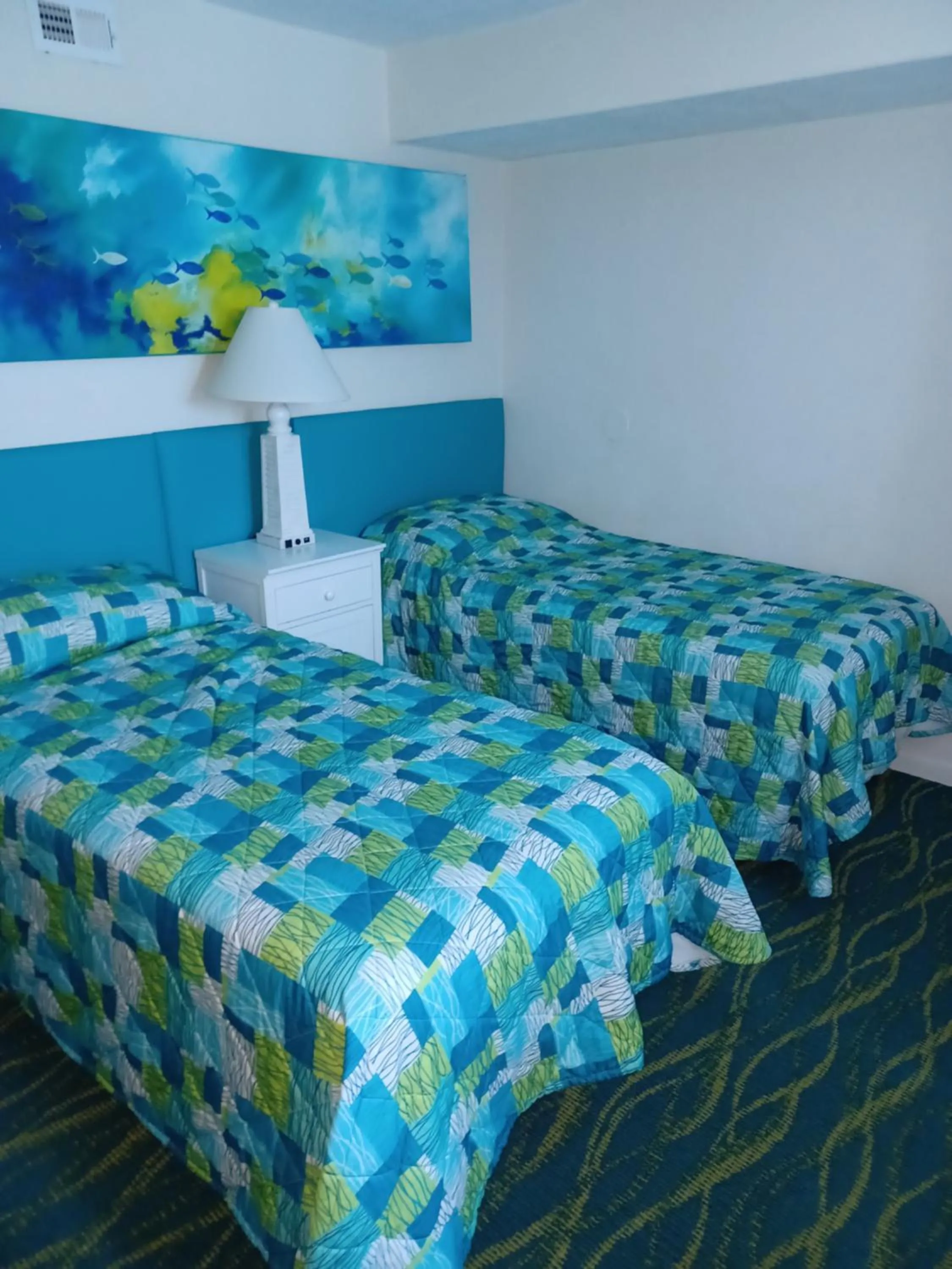 Bed in Islander Beach Resort - New Smyrna Beach