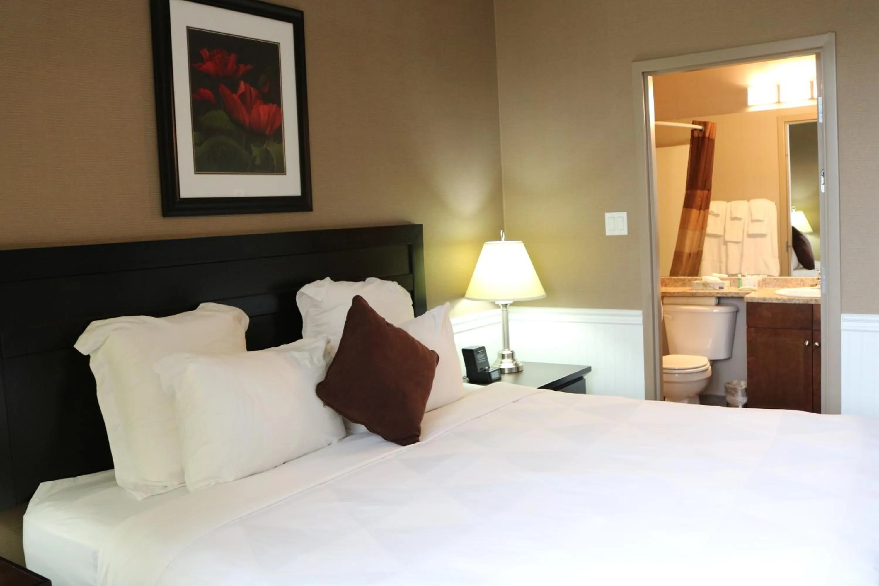 Bed in Nomad Hotel & Suites