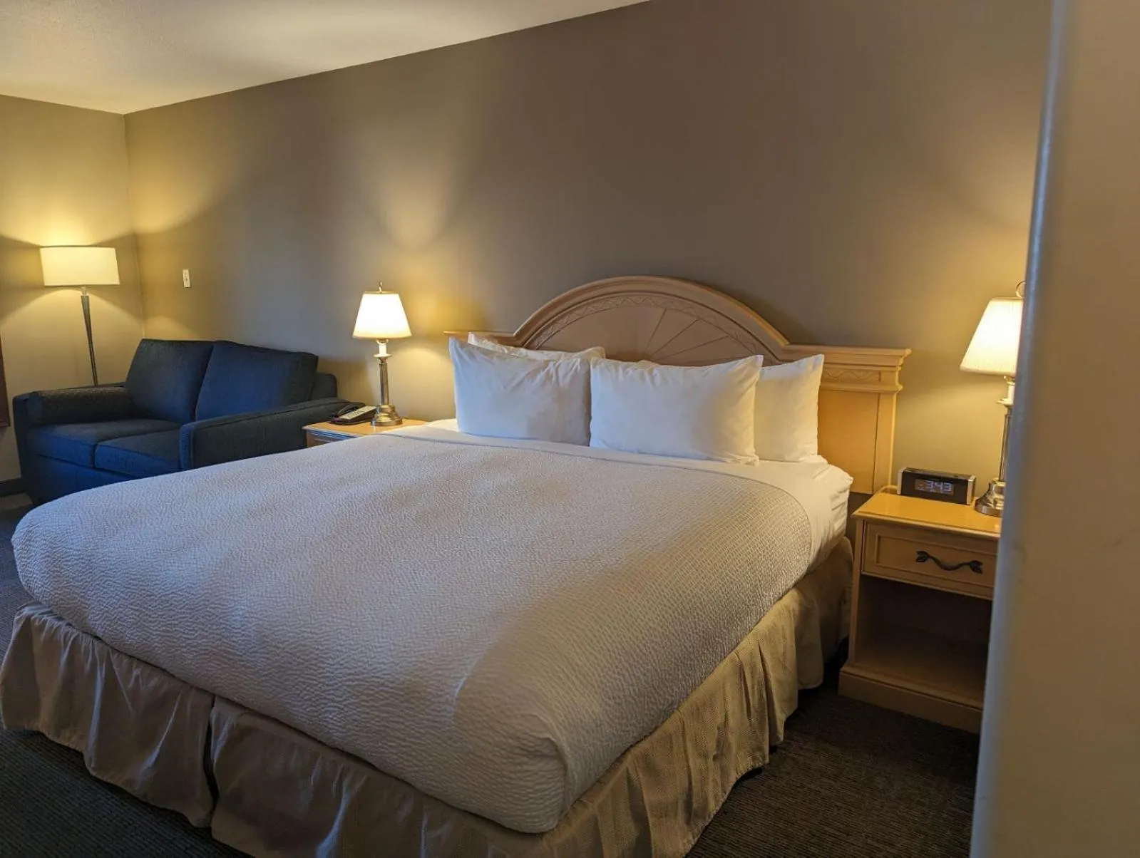 Photo of the whole room, Bed in Nomad Hotel & Suites