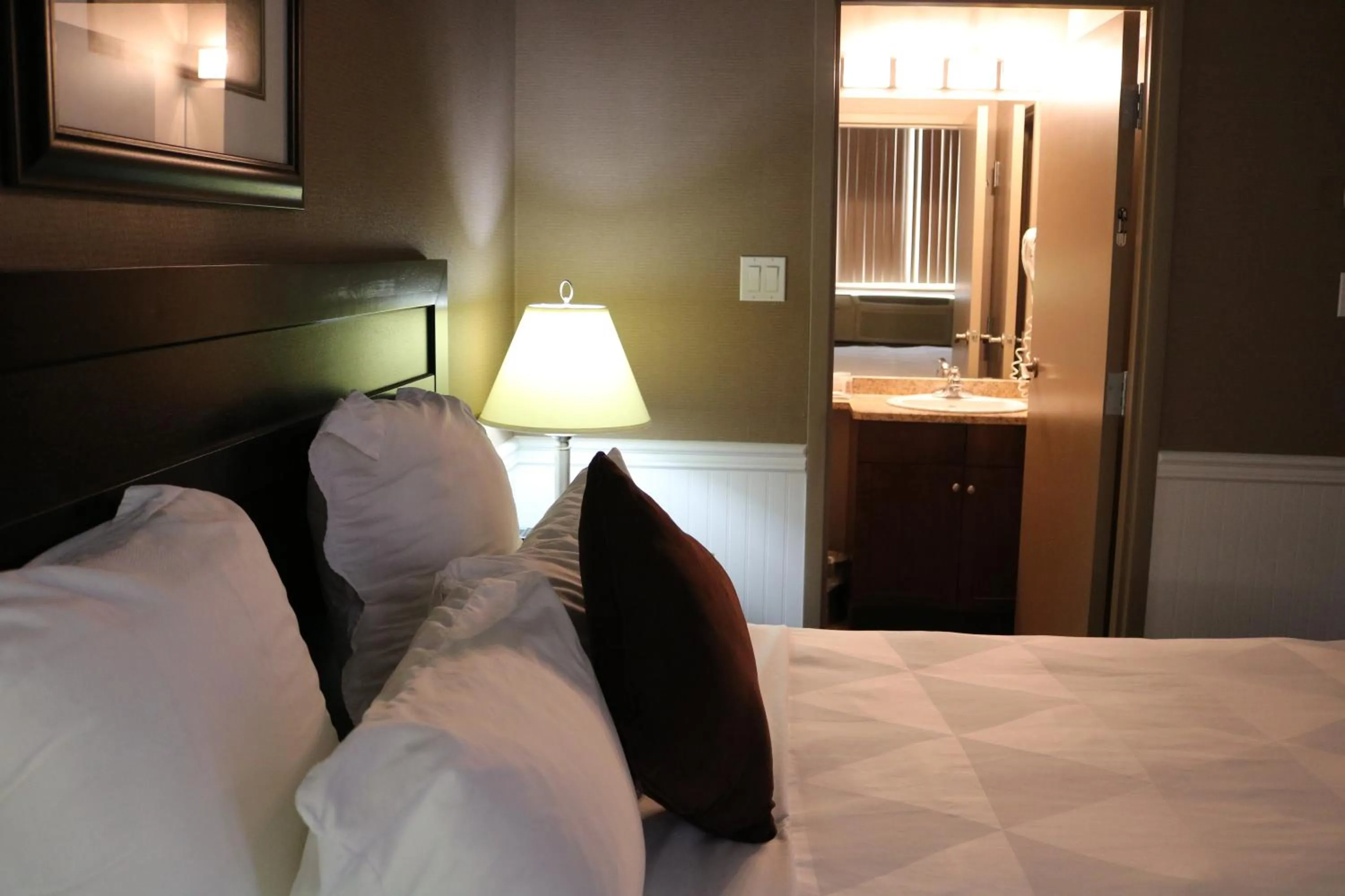 Bed in Nomad Hotel & Suites