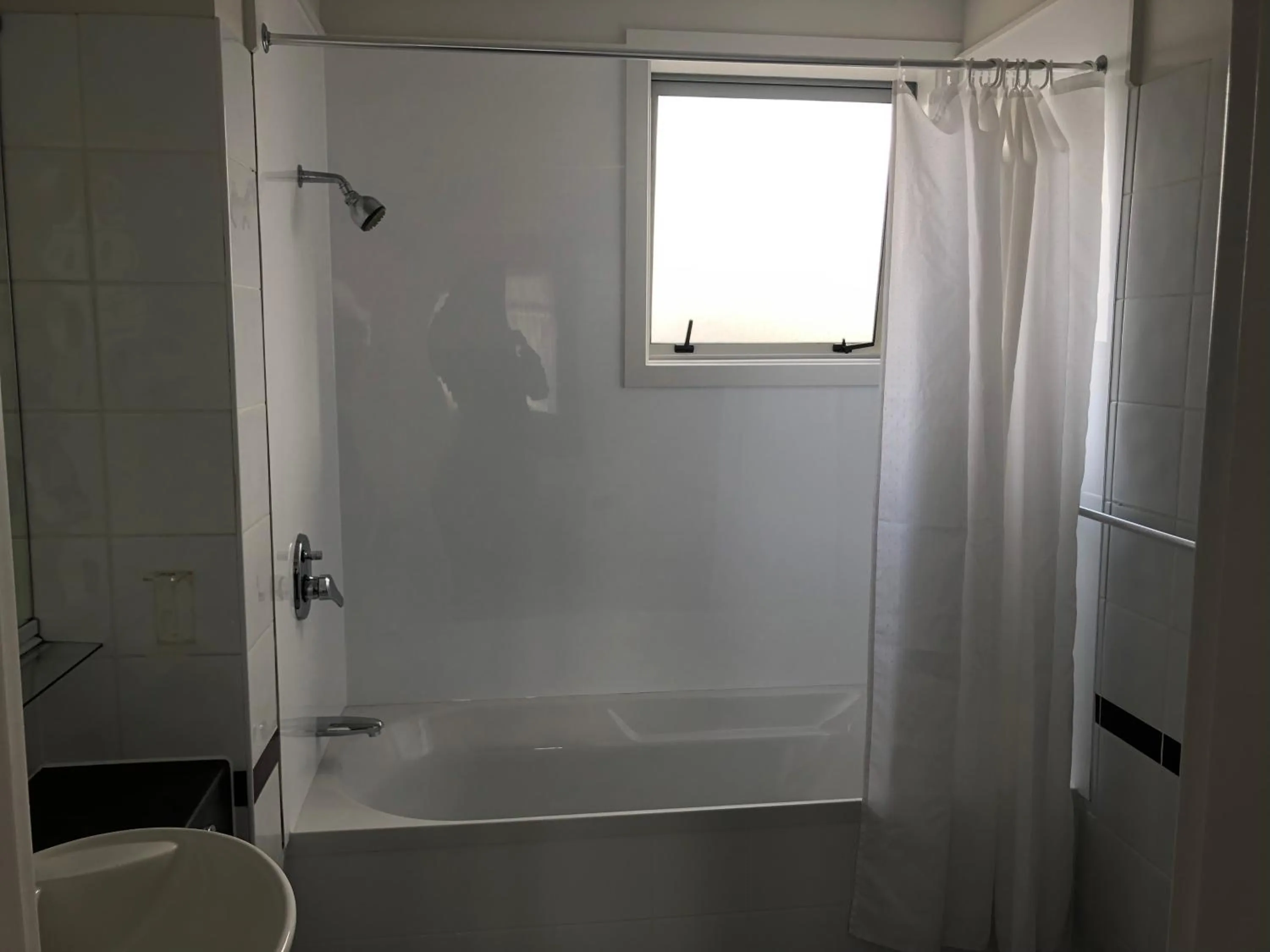 Bathroom in Ambassador Motor Inn