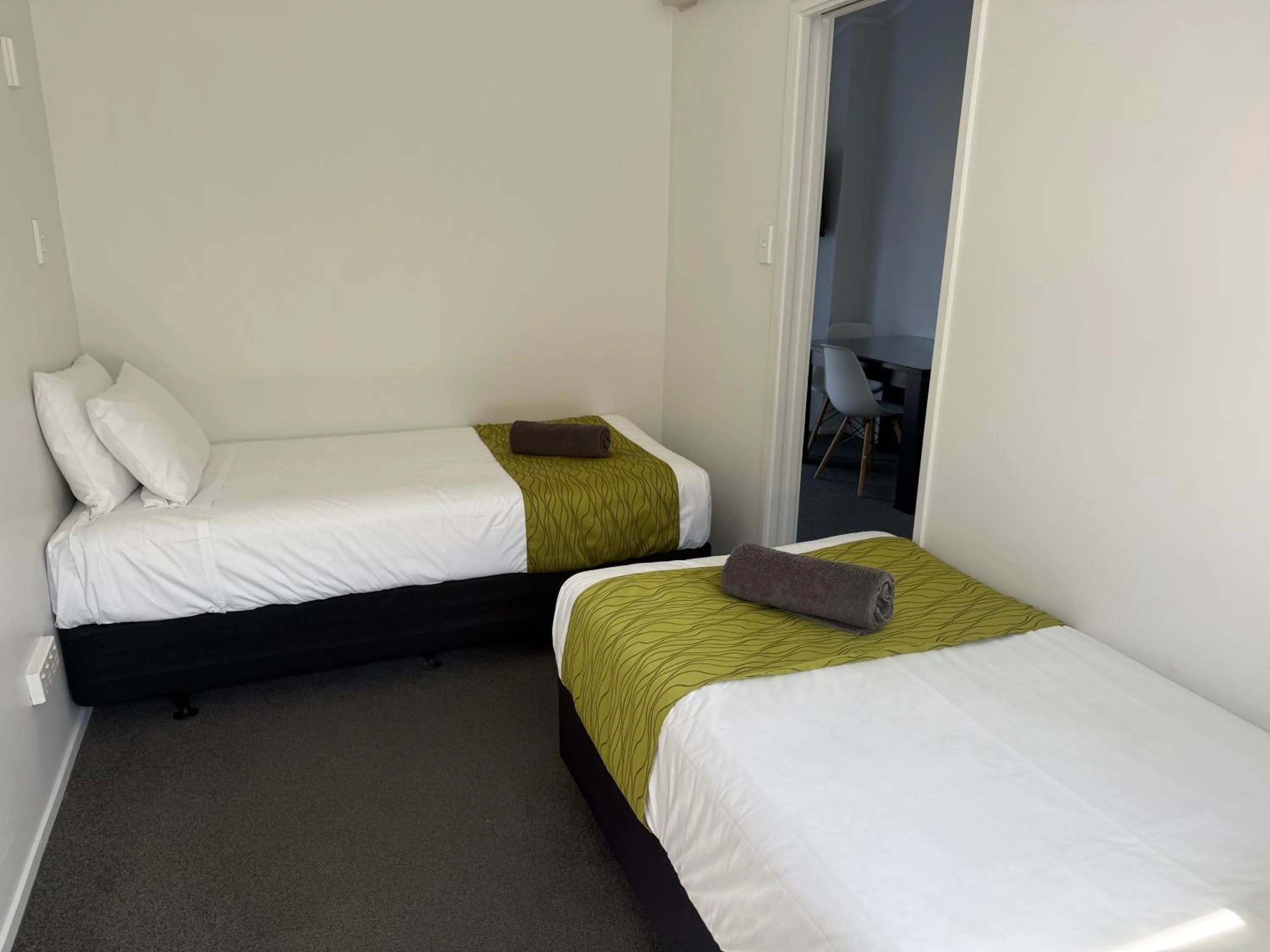 Bed in Ambassador Motor Inn