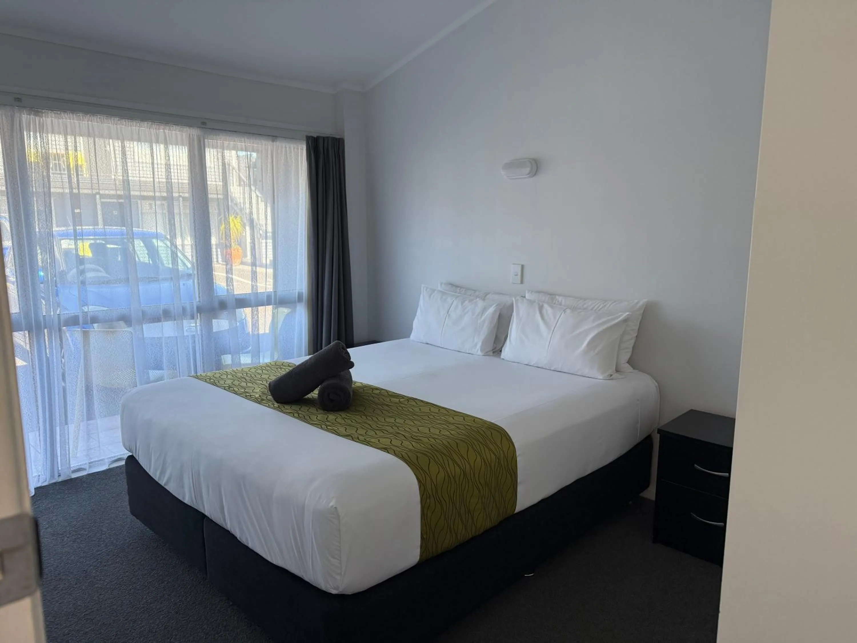 Bed in Ambassador Motor Inn