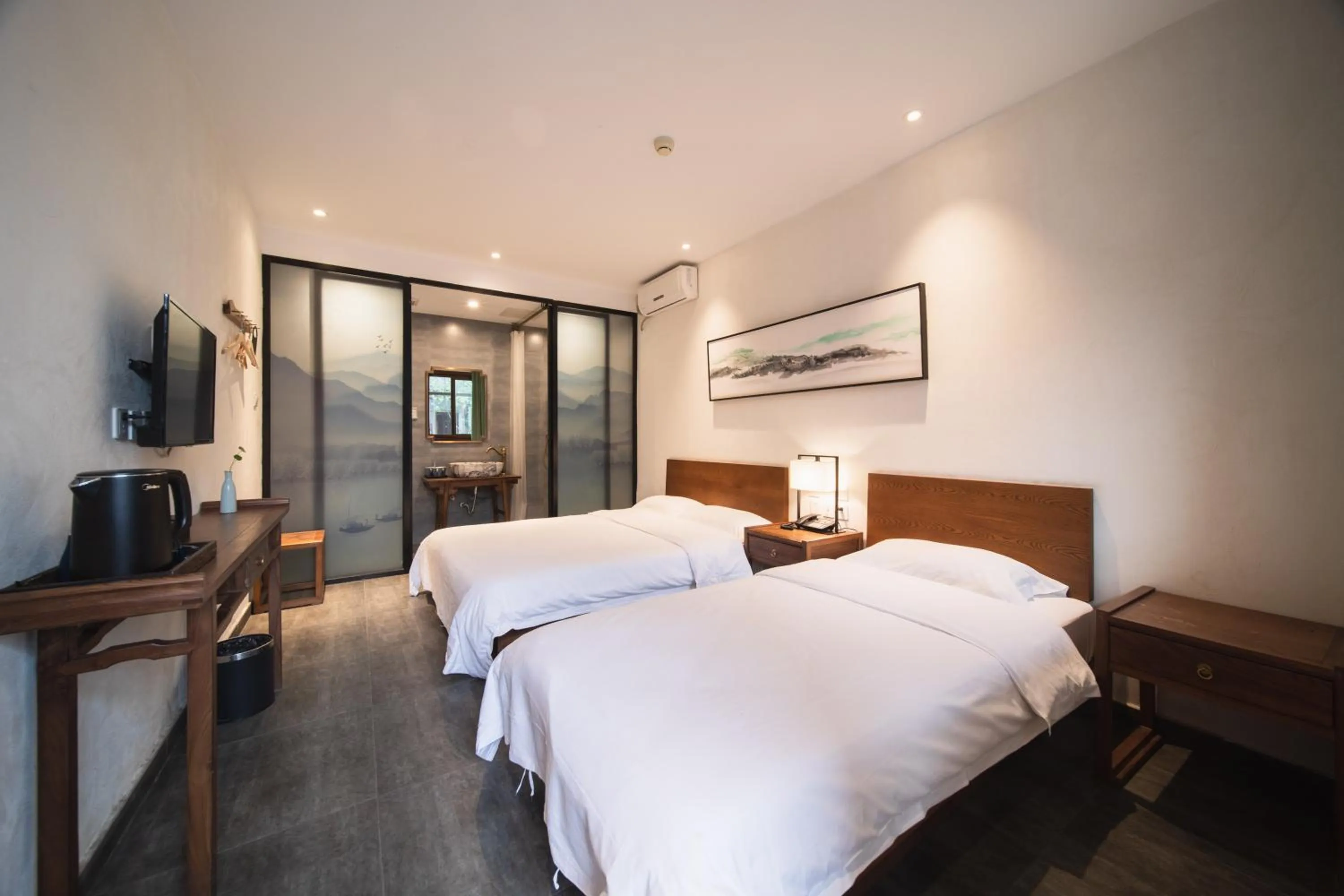 Bed in Guipu Beihai Courtyard Hotel Beijing