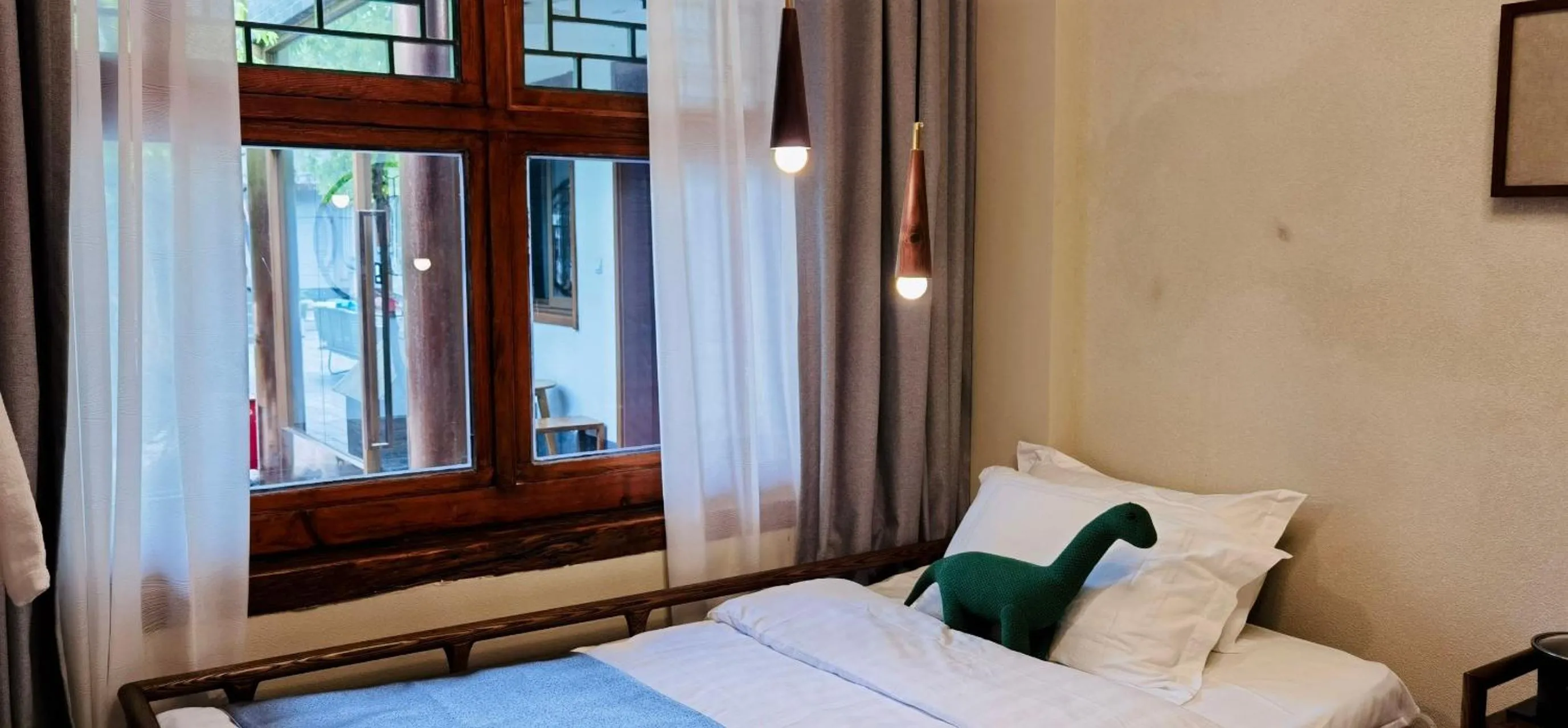 Bed in Guipu Beihai Courtyard Hotel Beijing