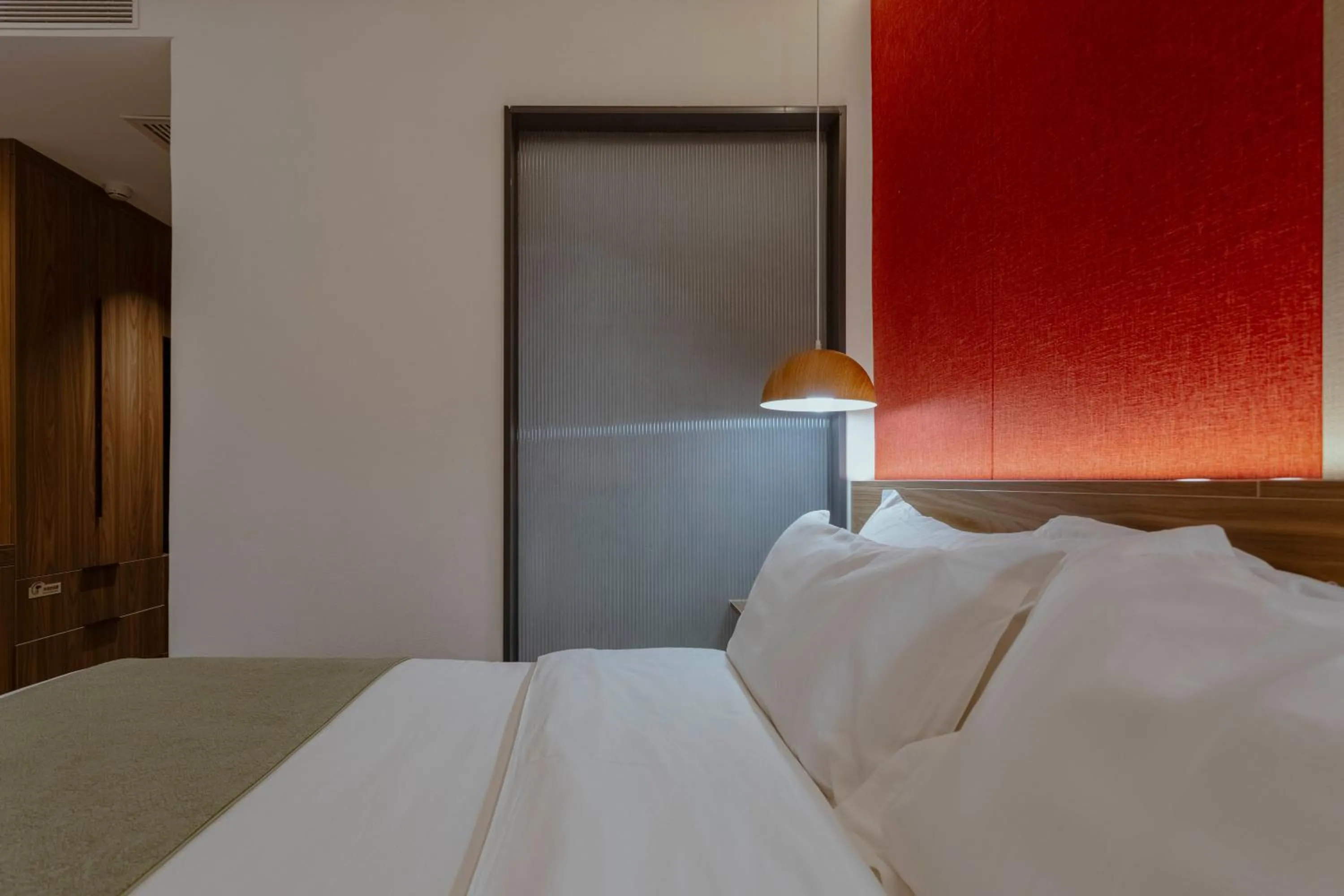 Bed in Guipu Beihai Courtyard Hotel Beijing