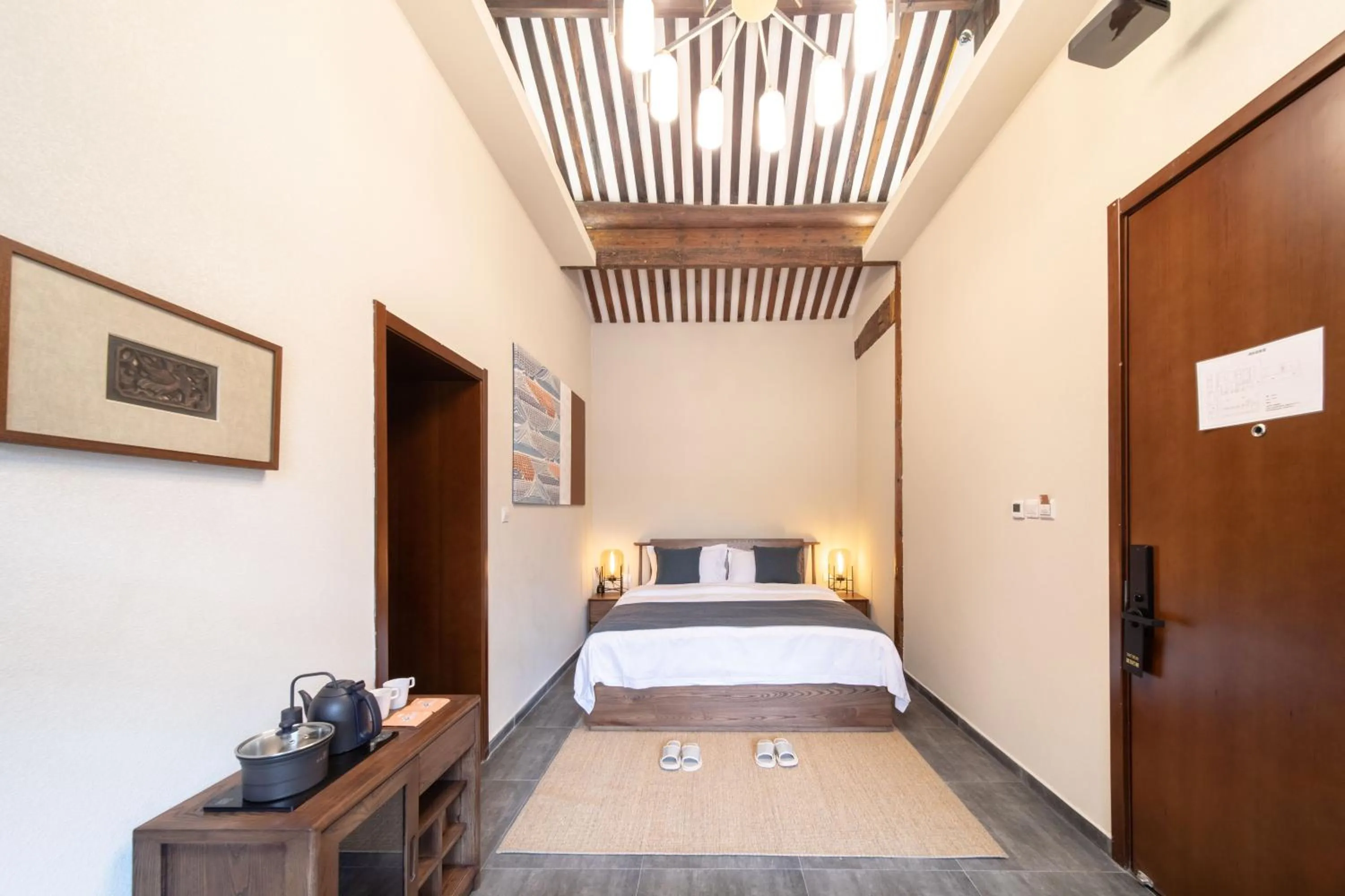 Bed in Guipu Beihai Courtyard Hotel Beijing