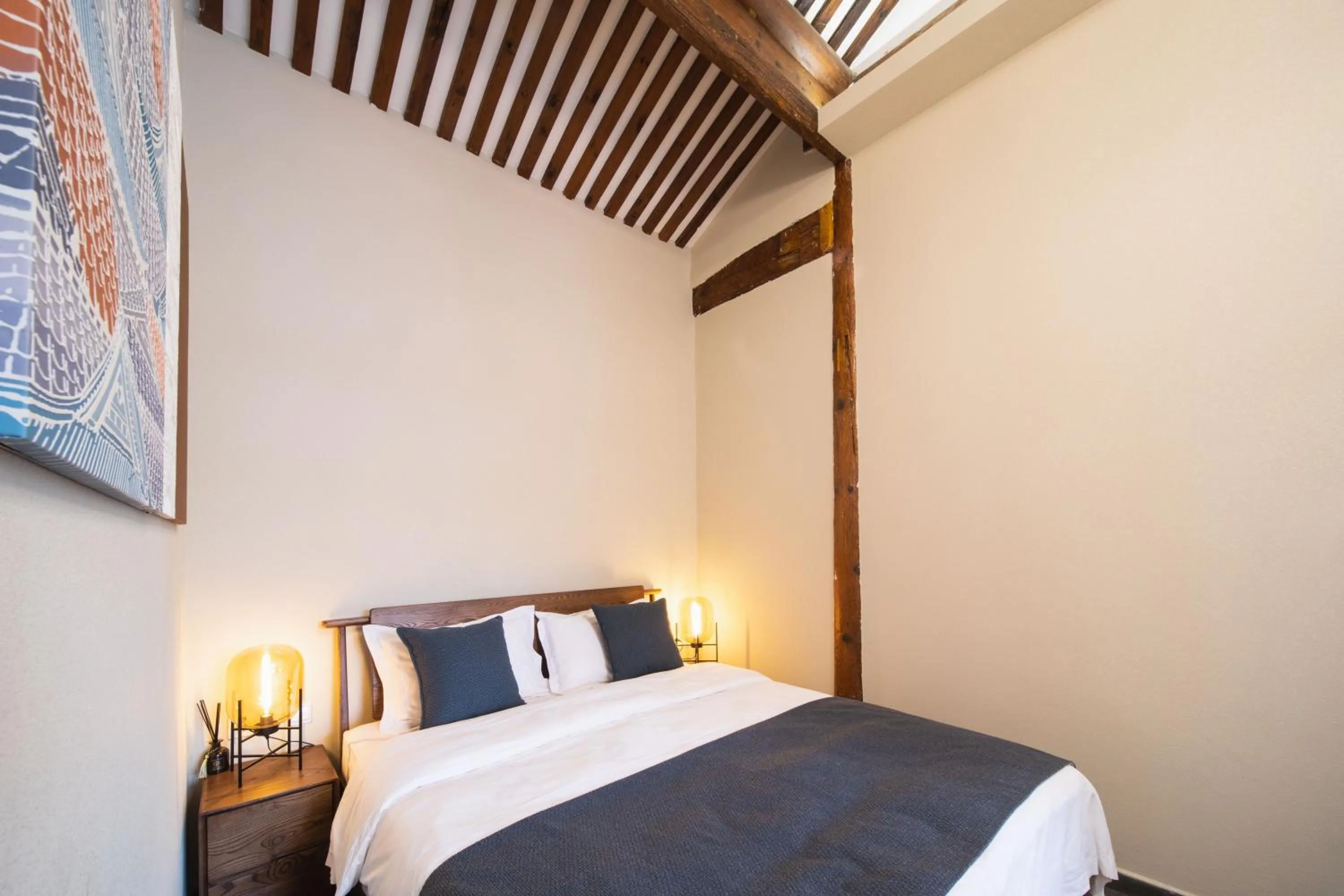 Bed in Guipu Beihai Courtyard Hotel Beijing