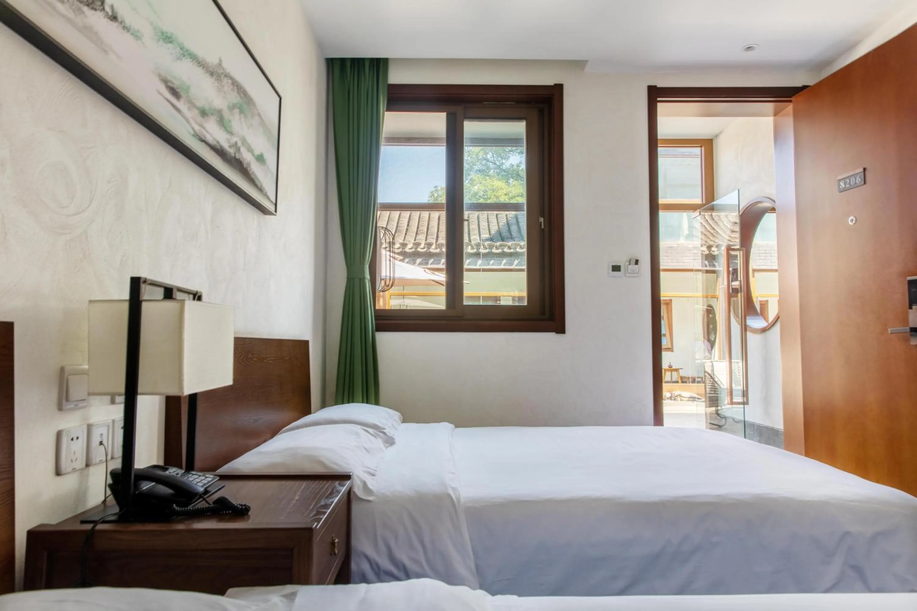 Bed in Guipu Beihai Courtyard Hotel Beijing