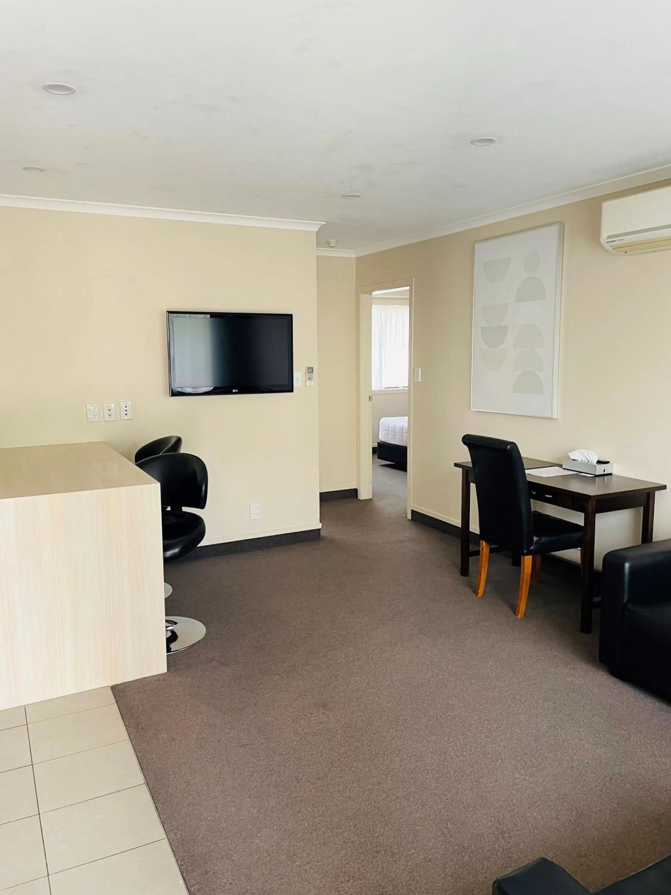 Living room in Kauri Court Motel and Apartments
