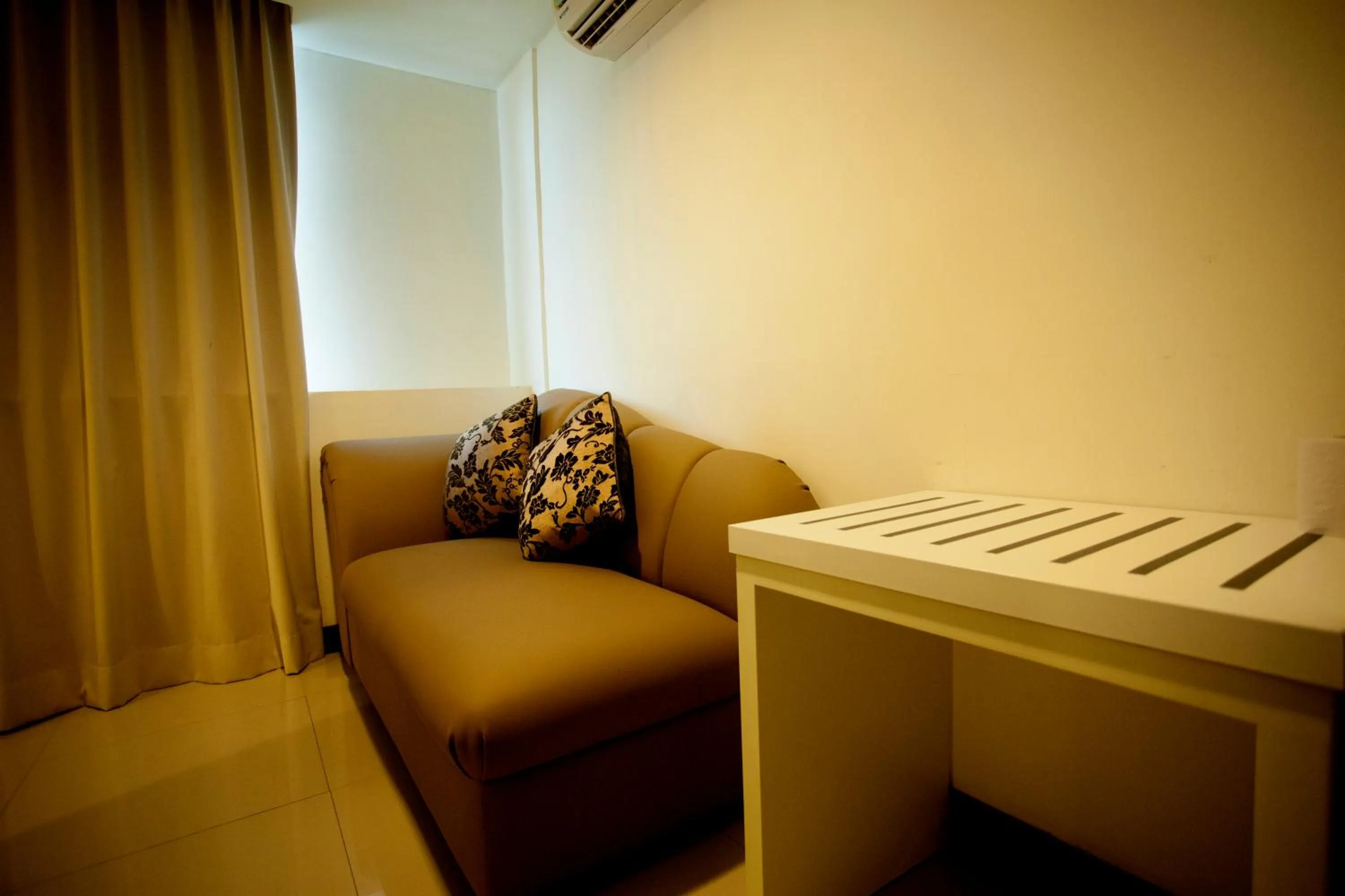Seating area in Mangga Boutique Hotel