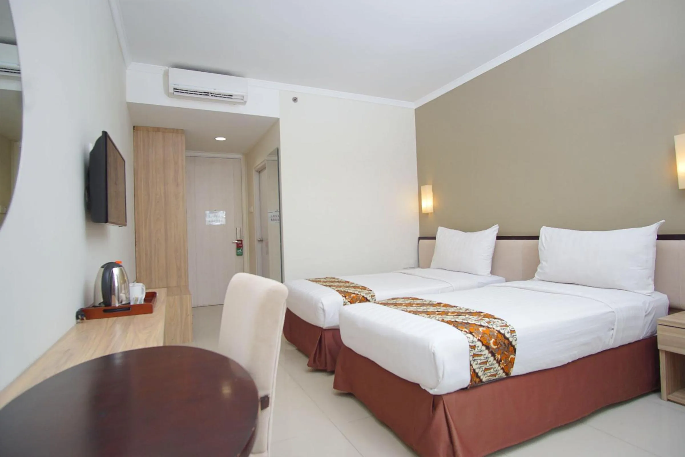 Bedroom in Sakanti City Hotel