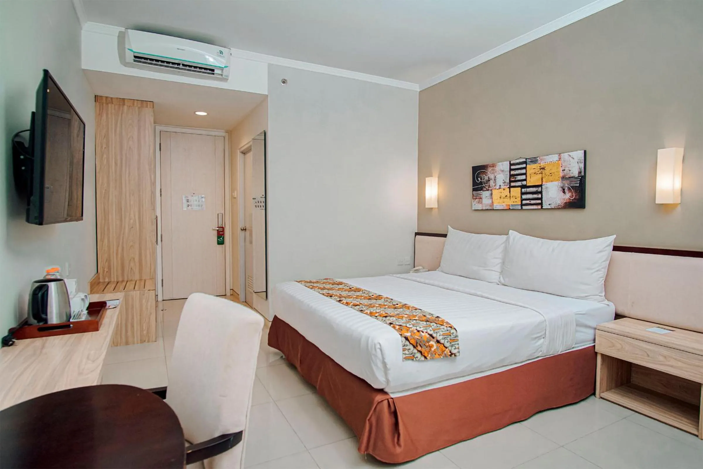 Bedroom in Sakanti City Hotel