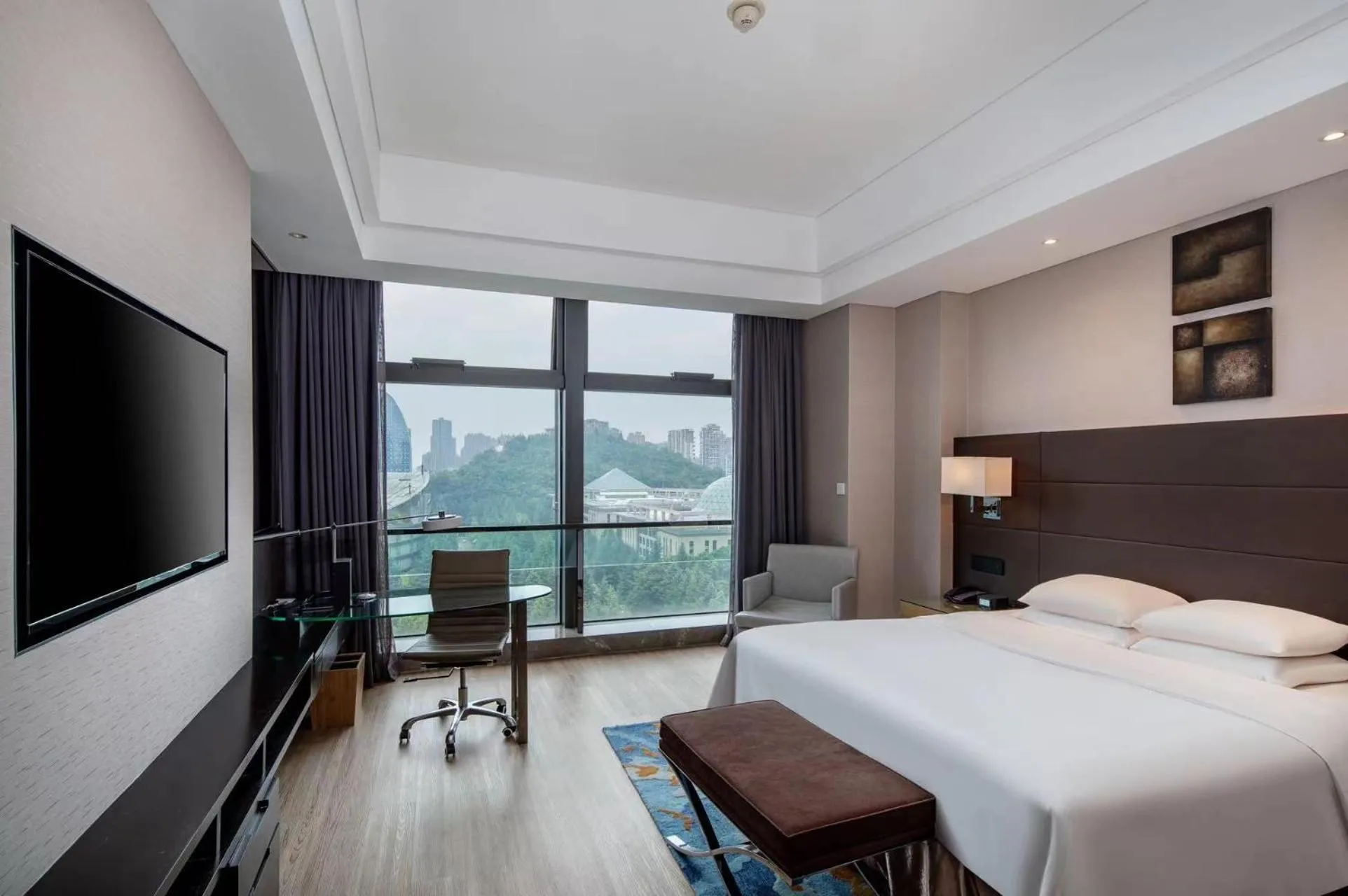 Bed in Renaissance Guiyang Hotel