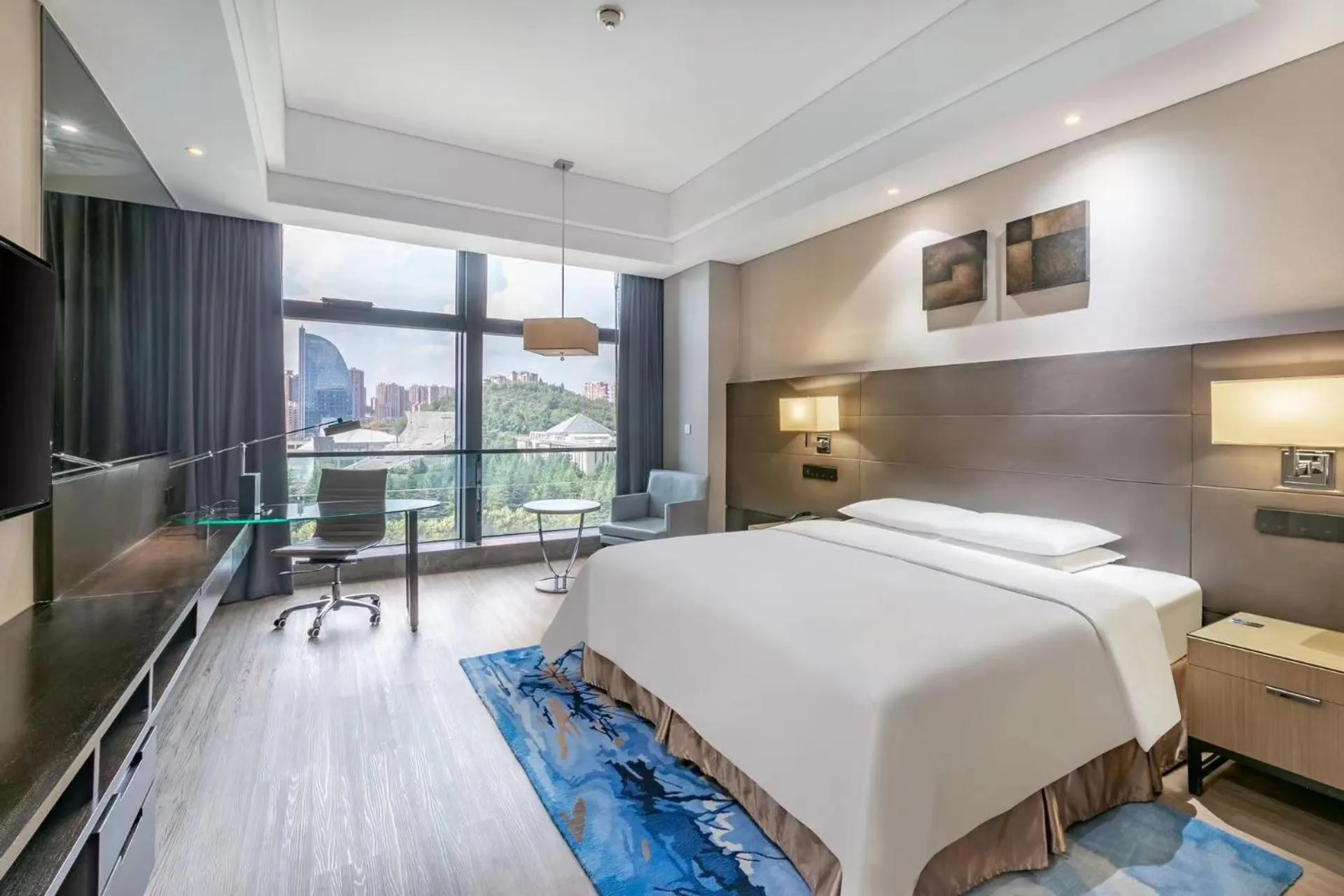 Bed in Renaissance Guiyang Hotel