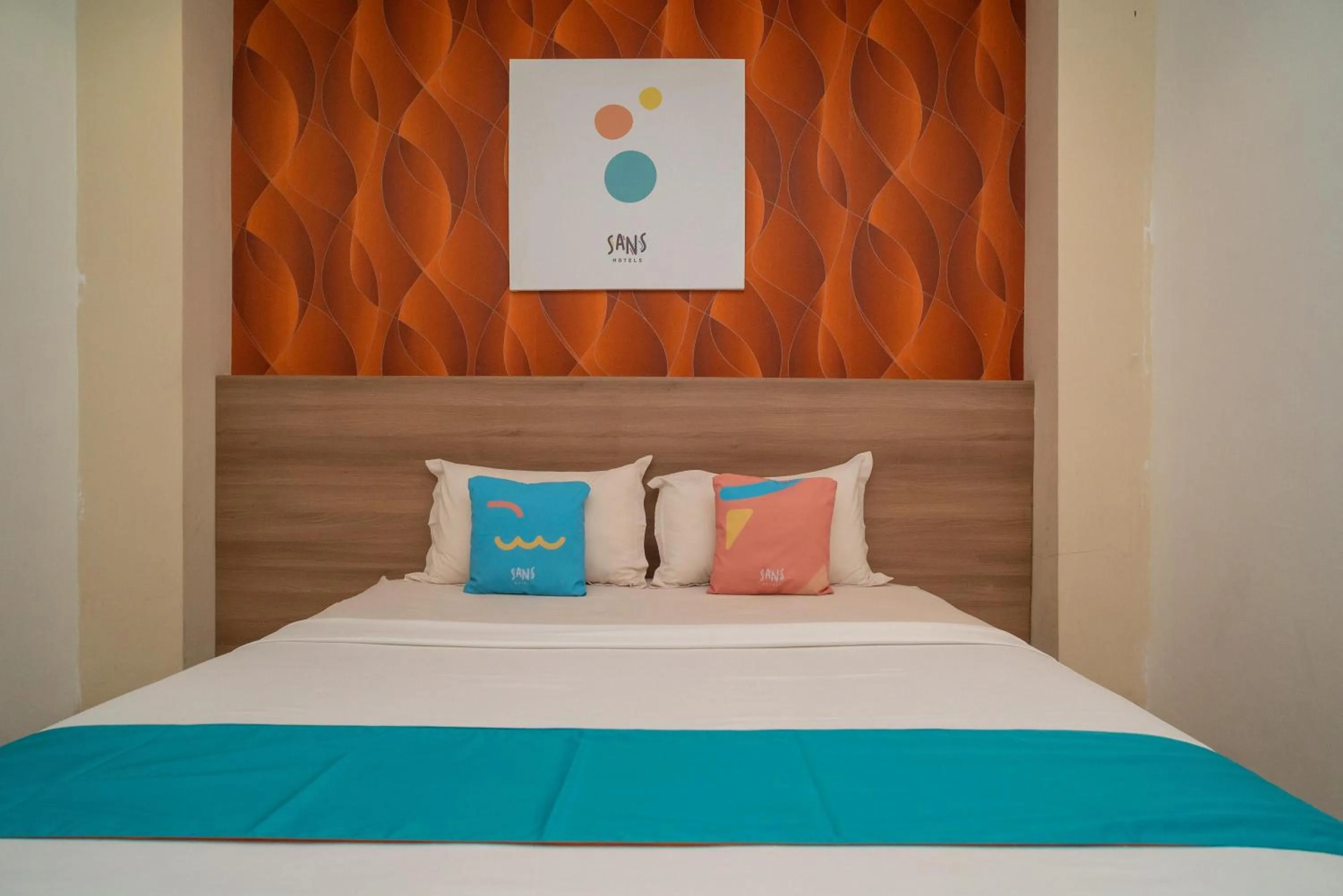 Bedroom, Bed in Sans Hotel Kupang Indah Surabaya