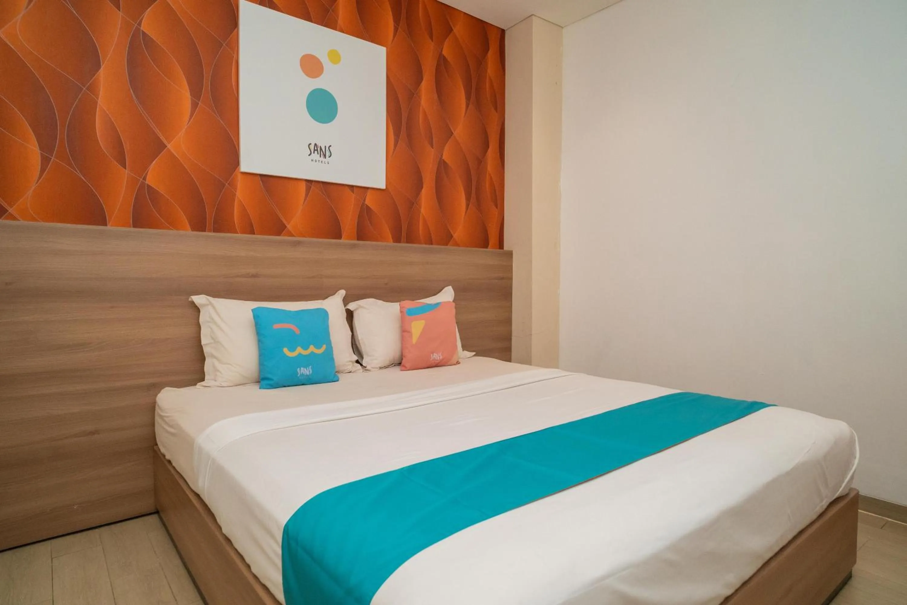 Bedroom, Bed in Sans Hotel Kupang Indah Surabaya