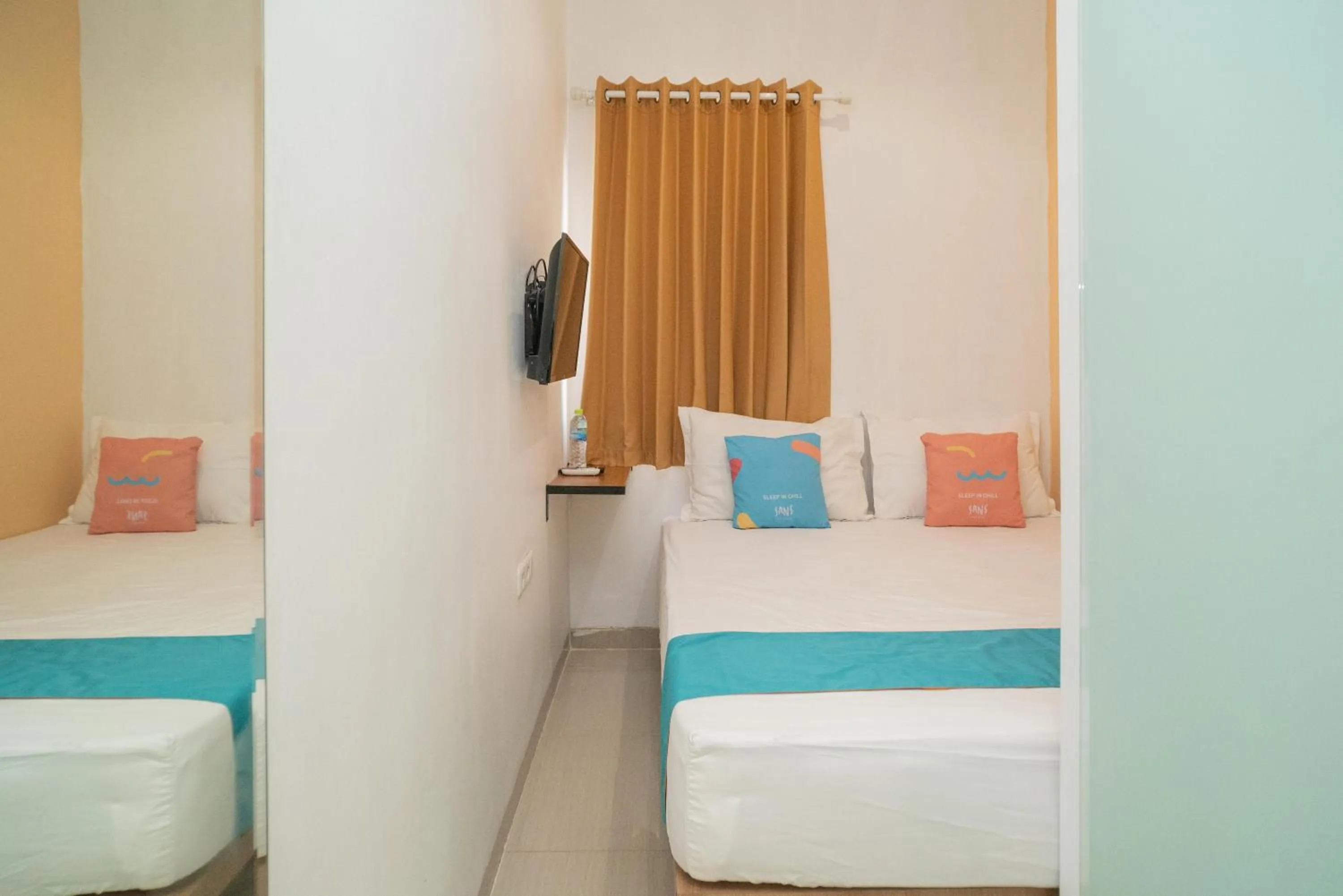 Bedroom, Bed in Sans Hotel Kupang Indah Surabaya