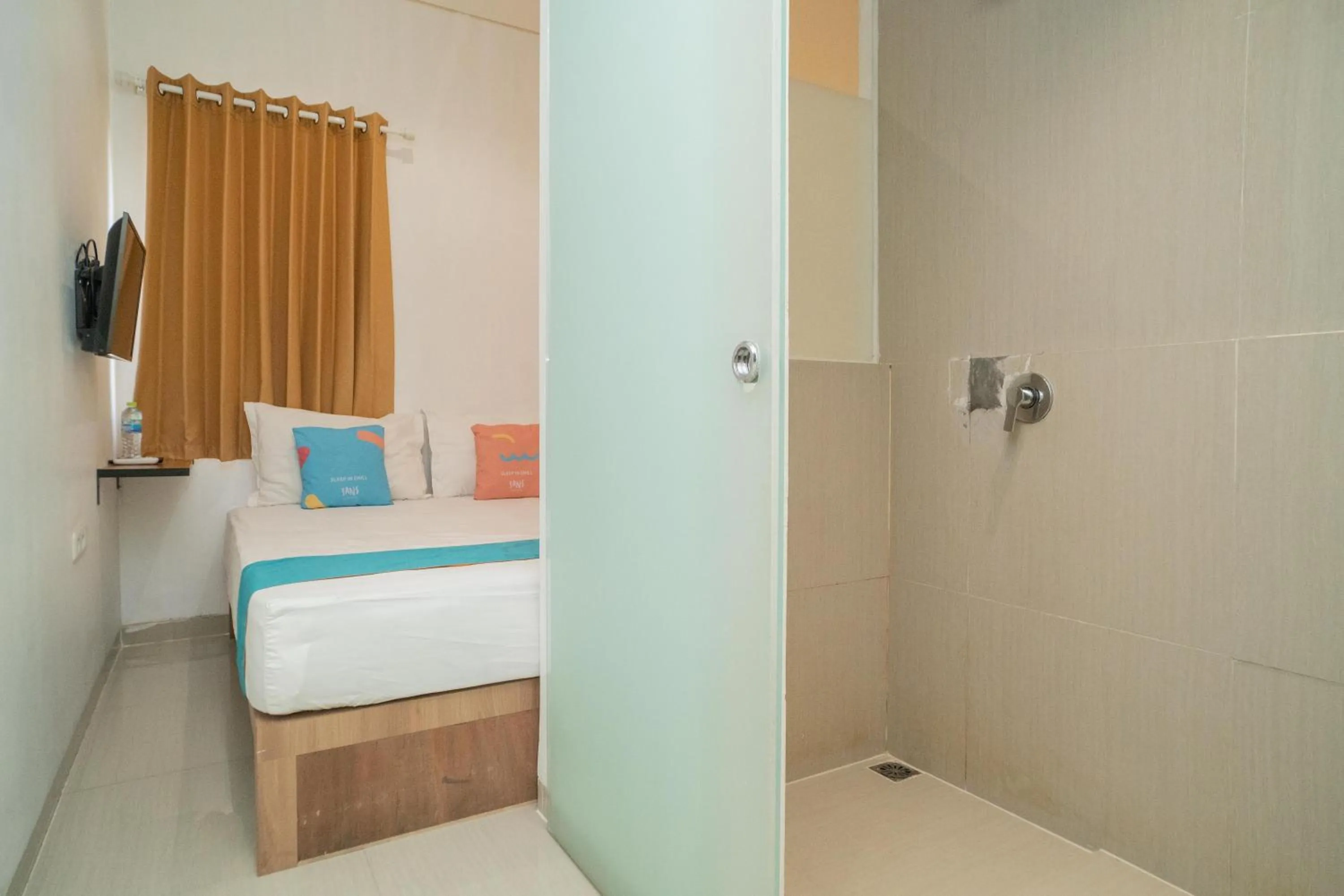 Bedroom, Bed in Sans Hotel Kupang Indah Surabaya