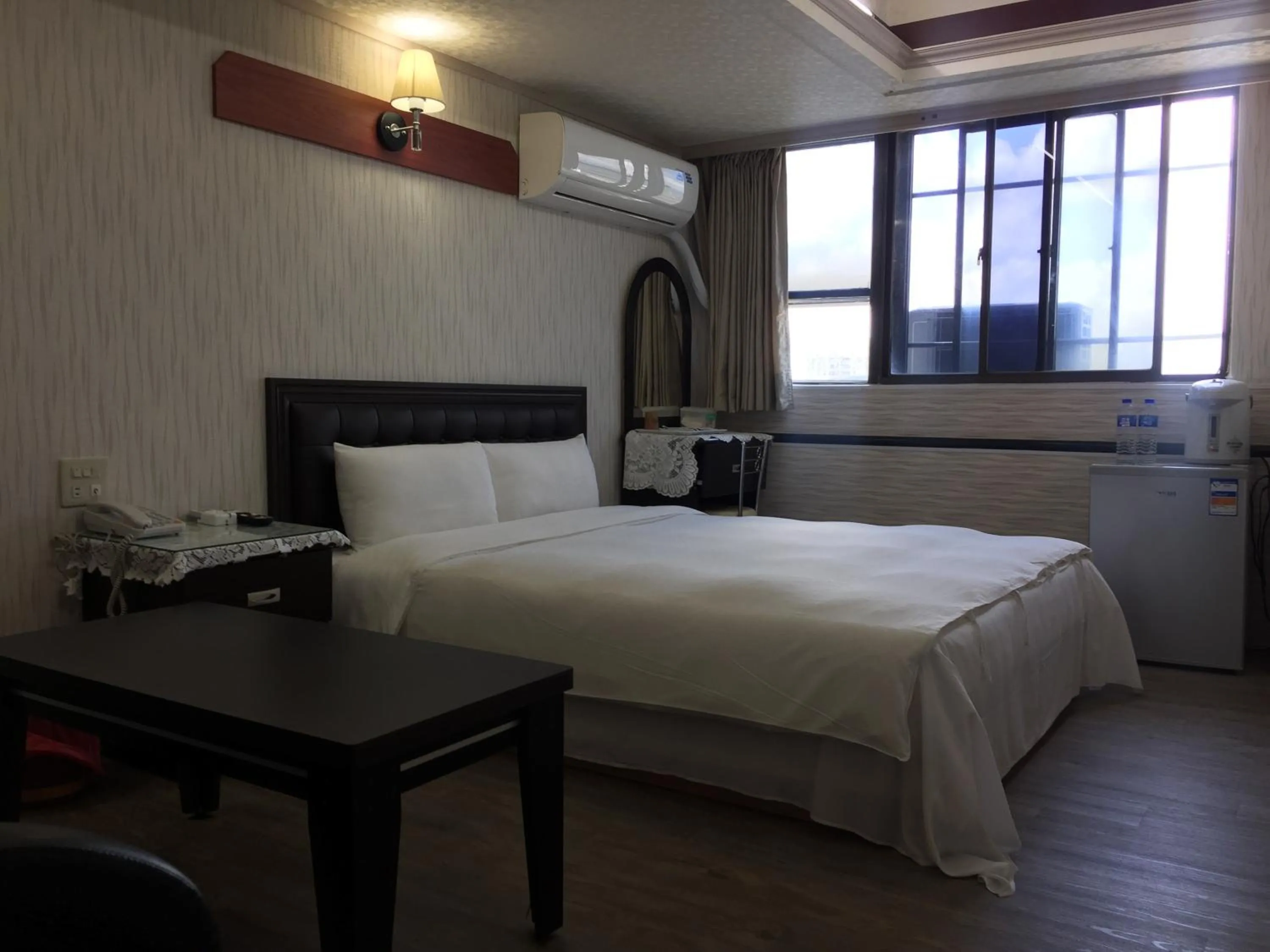 Bed in King Lo Tung Hotel