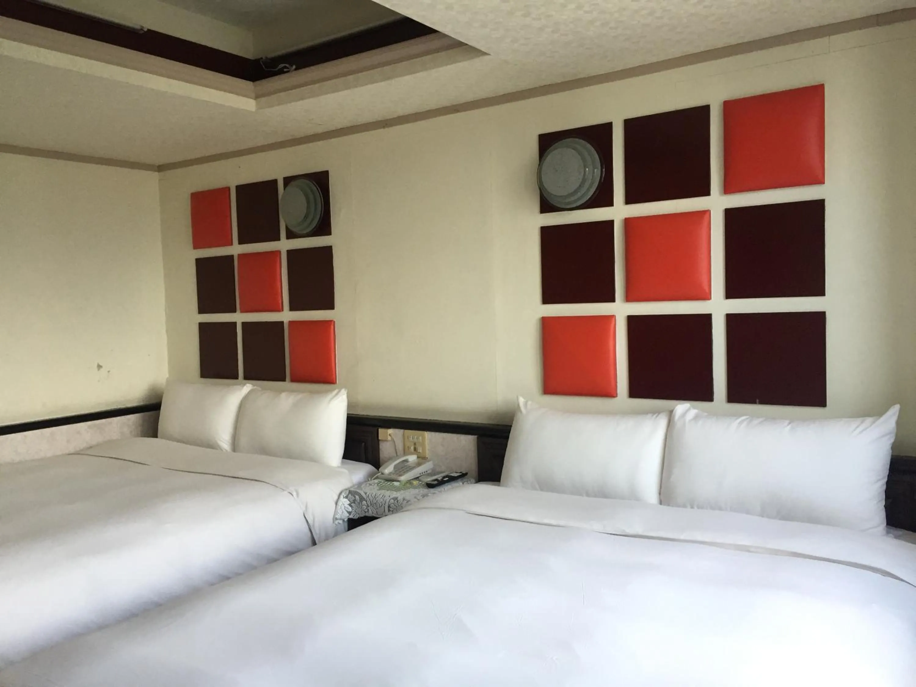 Bed in King Lo Tung Hotel