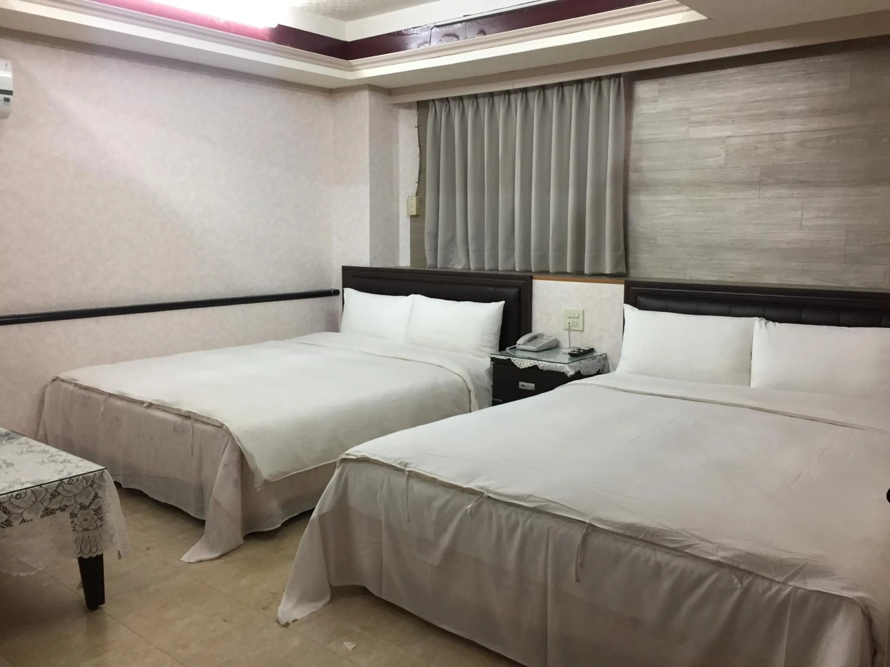 Bed in King Lo Tung Hotel