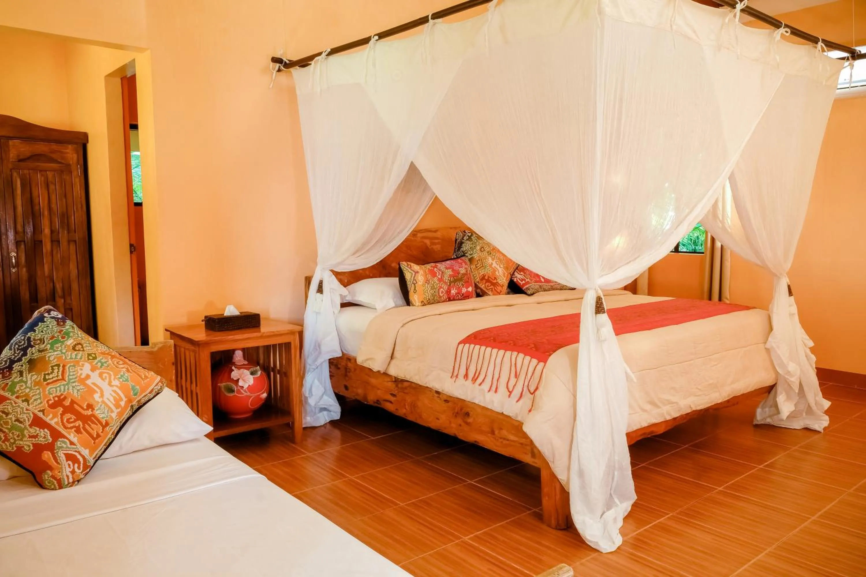 Bed in Flower Island Resort