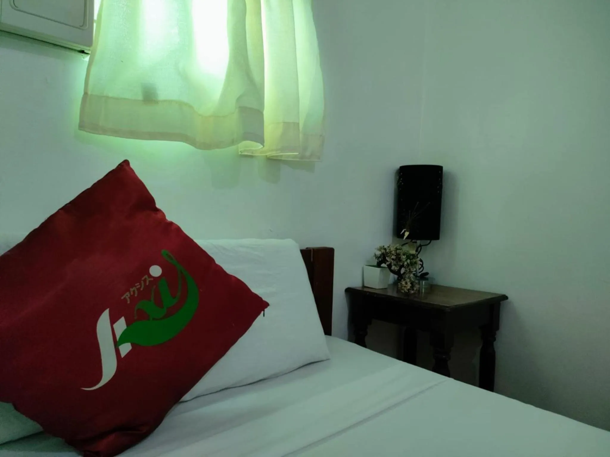 Bed in Axis Pension Hotel