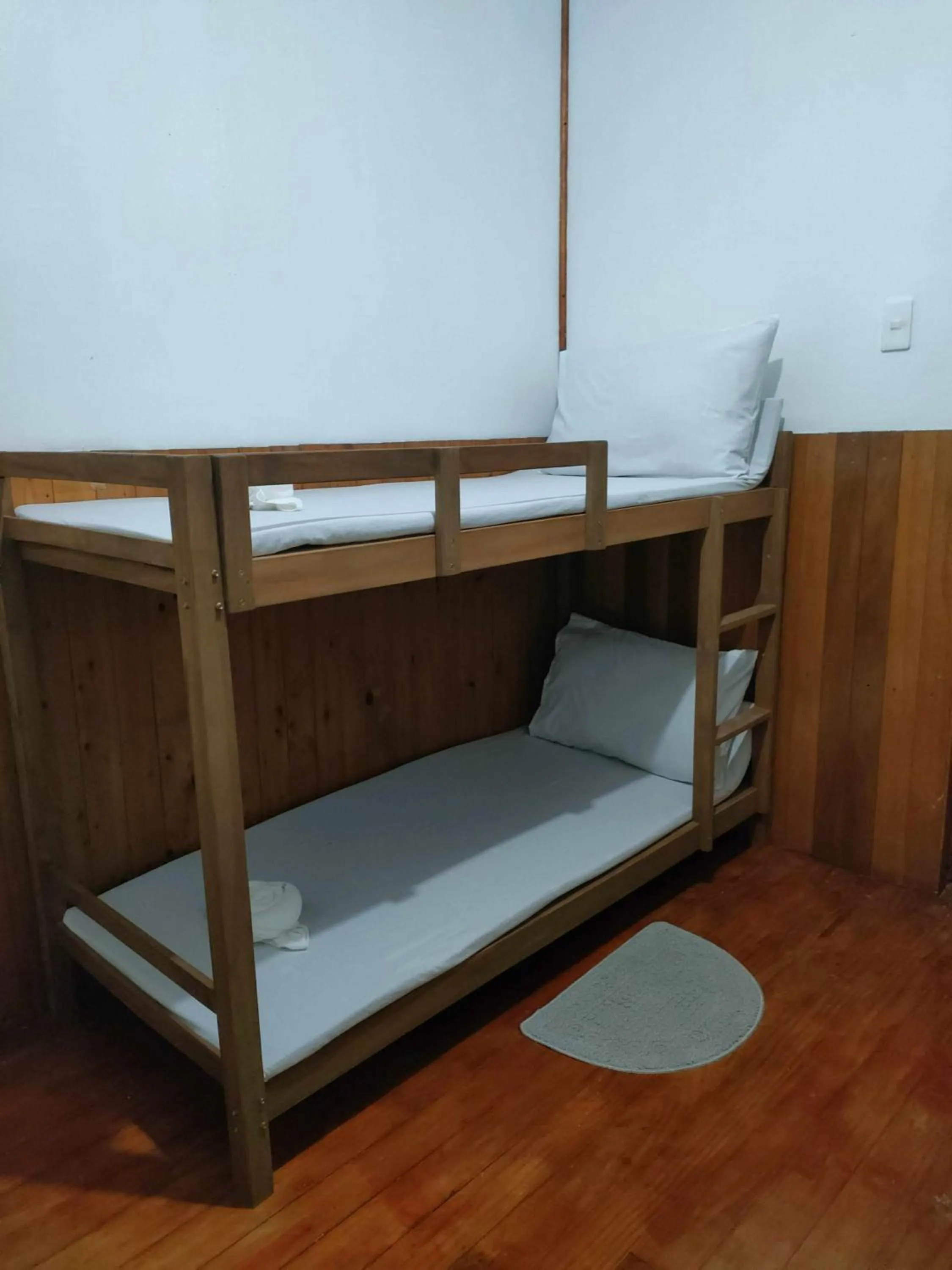 Bed in Axis Pension Hotel