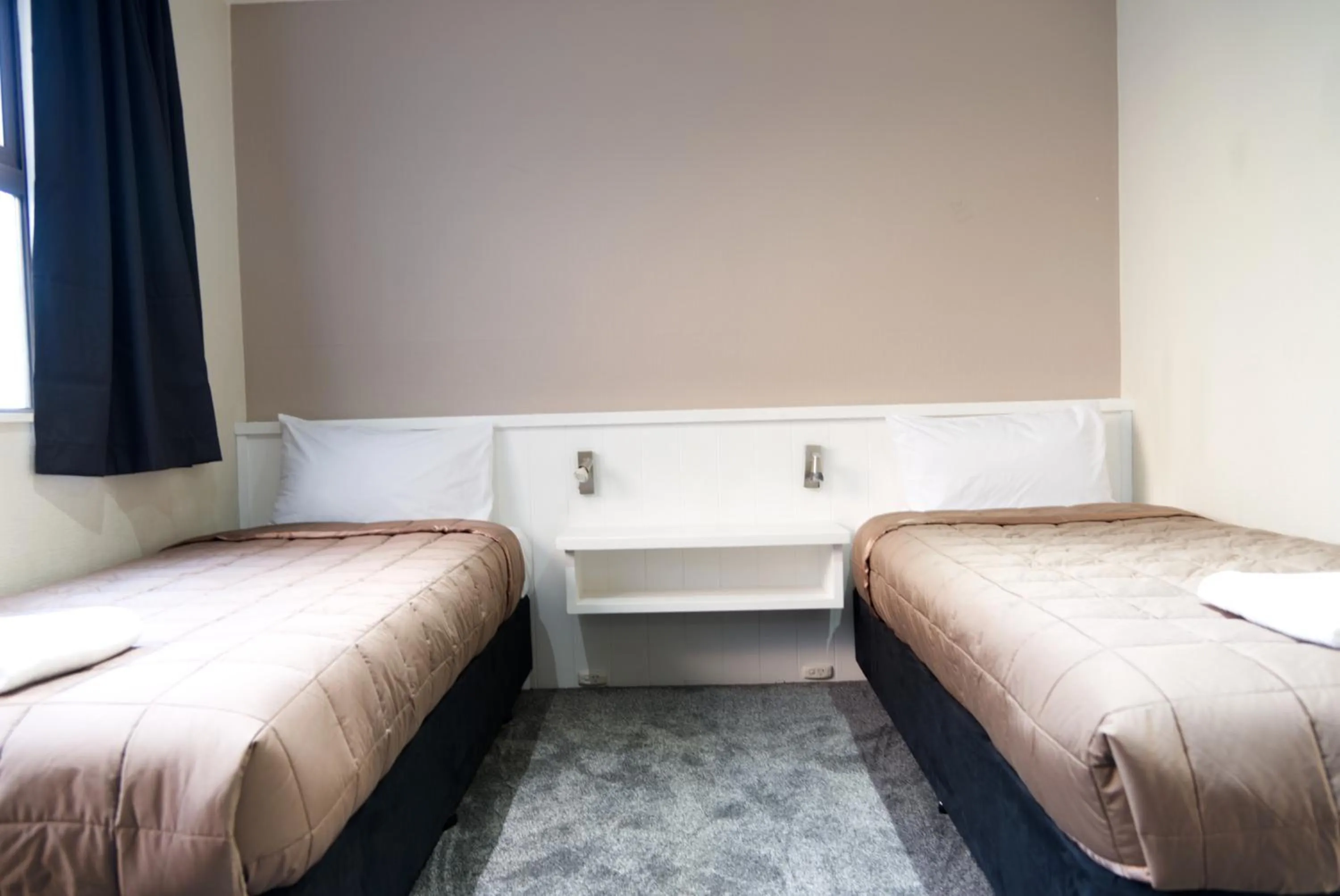 Bed in Aotea Lodge Porirua