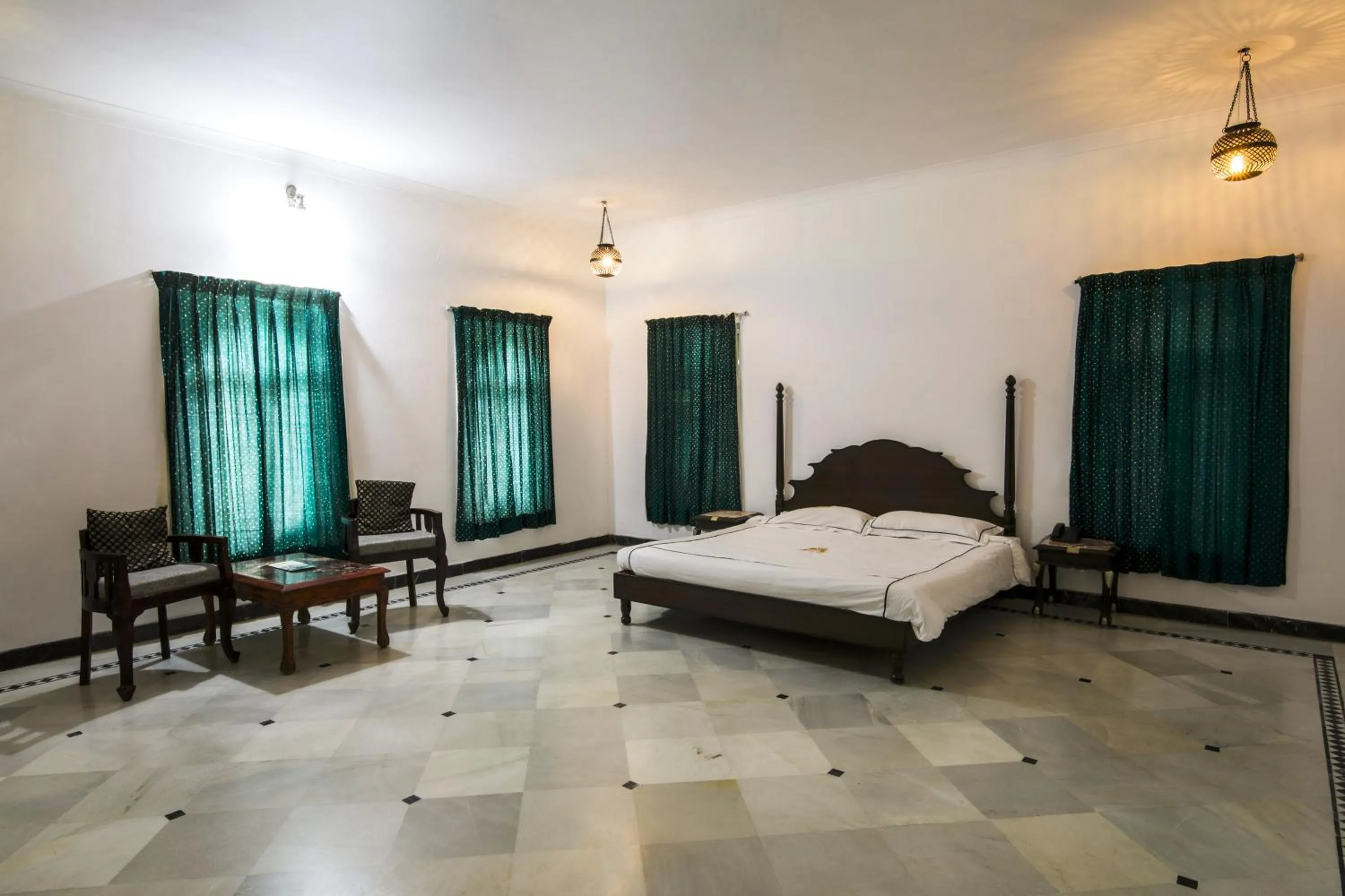Bed in Shahpura Kumbhal Villas