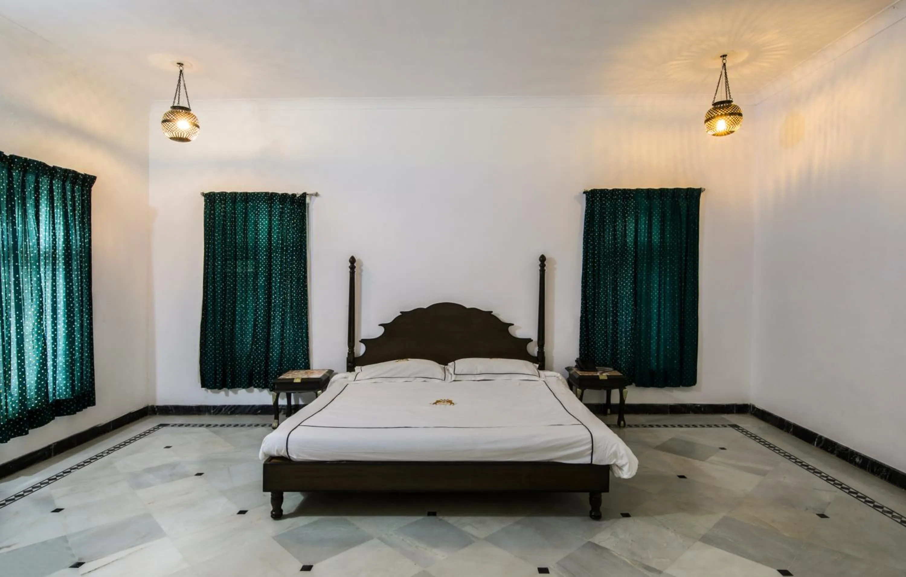 Bed in Shahpura Kumbhal Villas