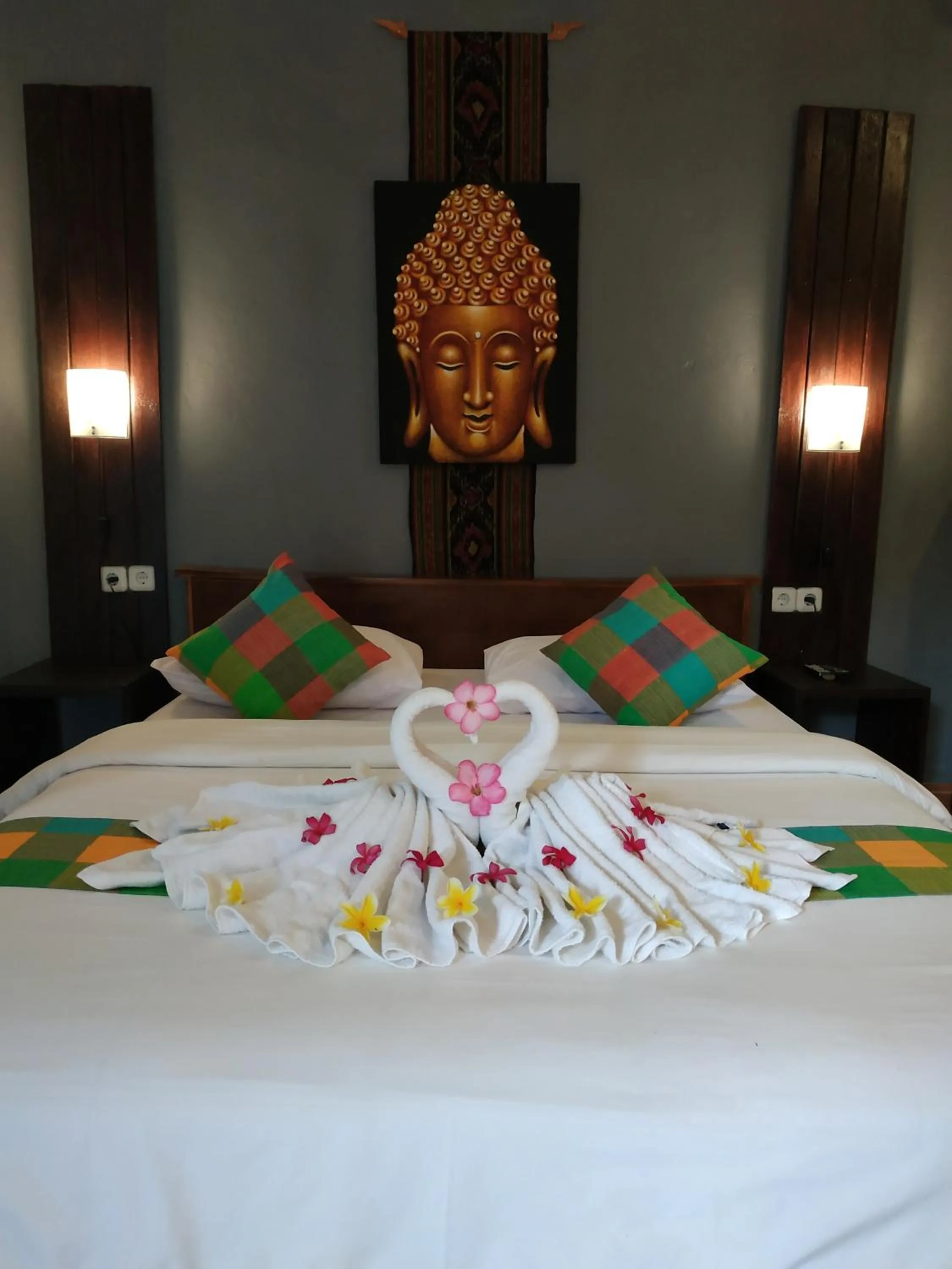 Bed in Kuri Garden Cottage