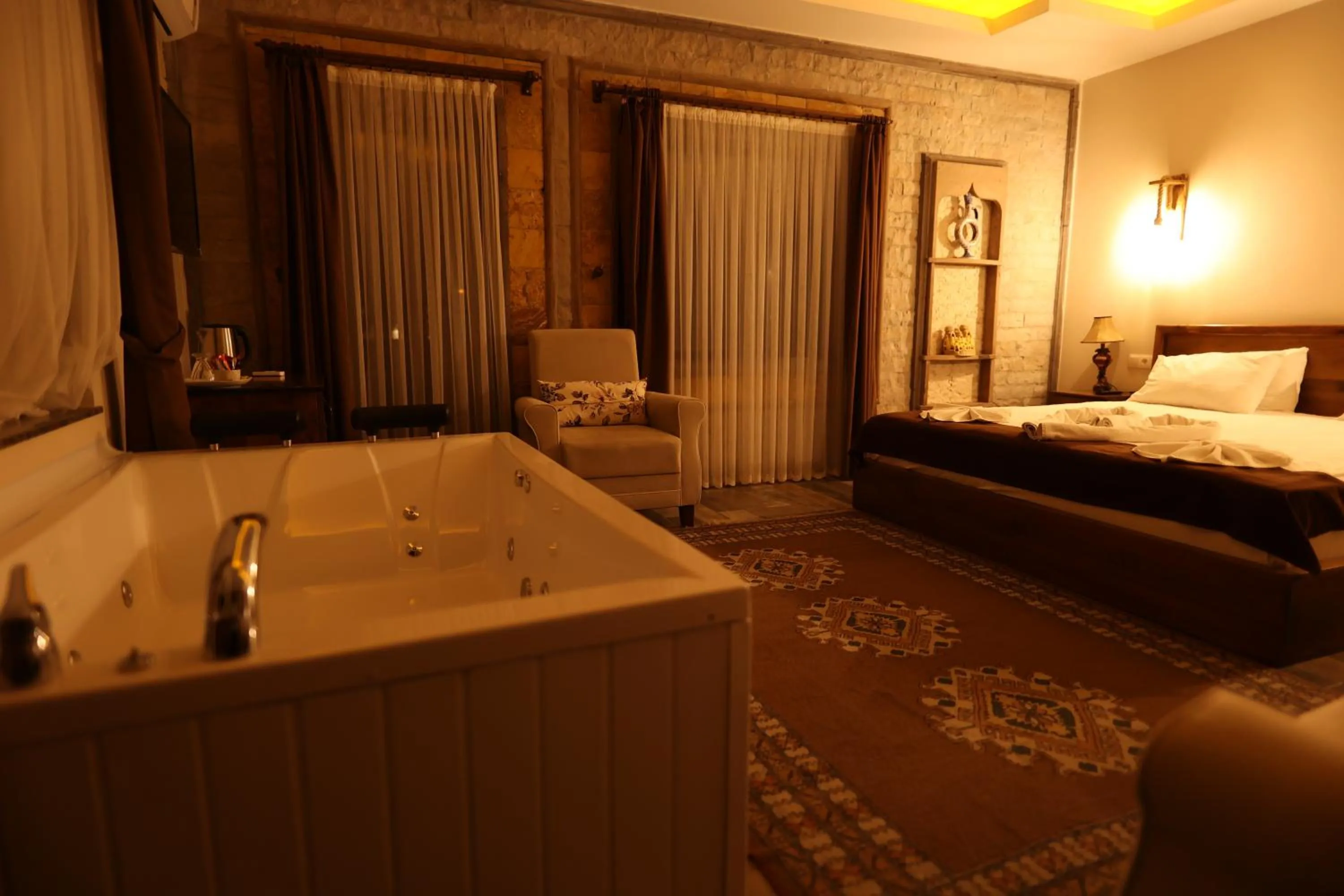 Bed in EL NAZAR STONE SUİTE