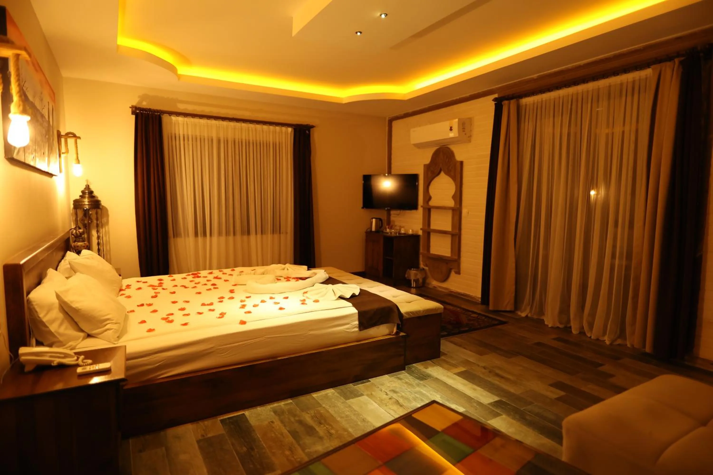 Bed in EL NAZAR STONE SUİTE