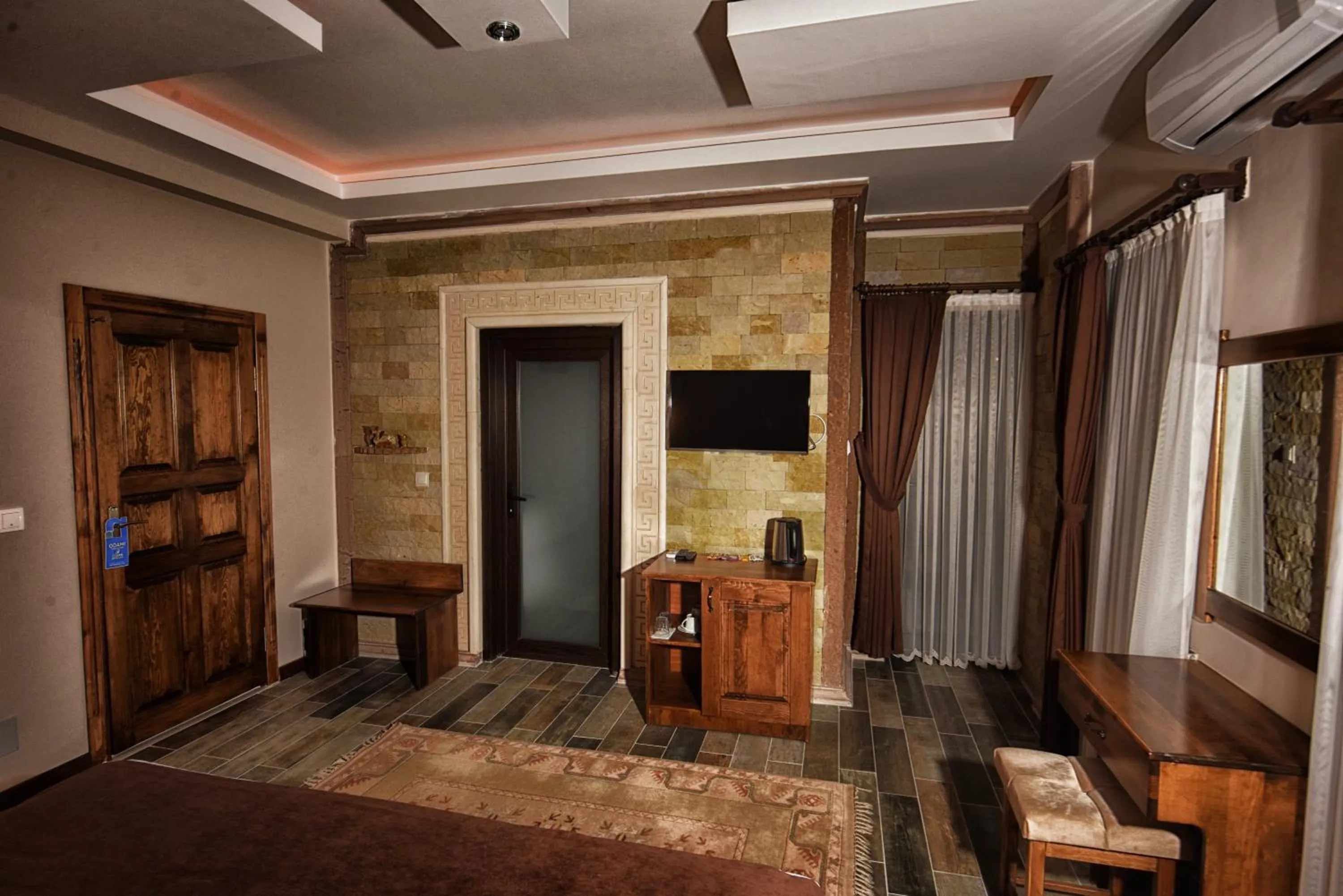 Living room in EL NAZAR STONE SUİTE