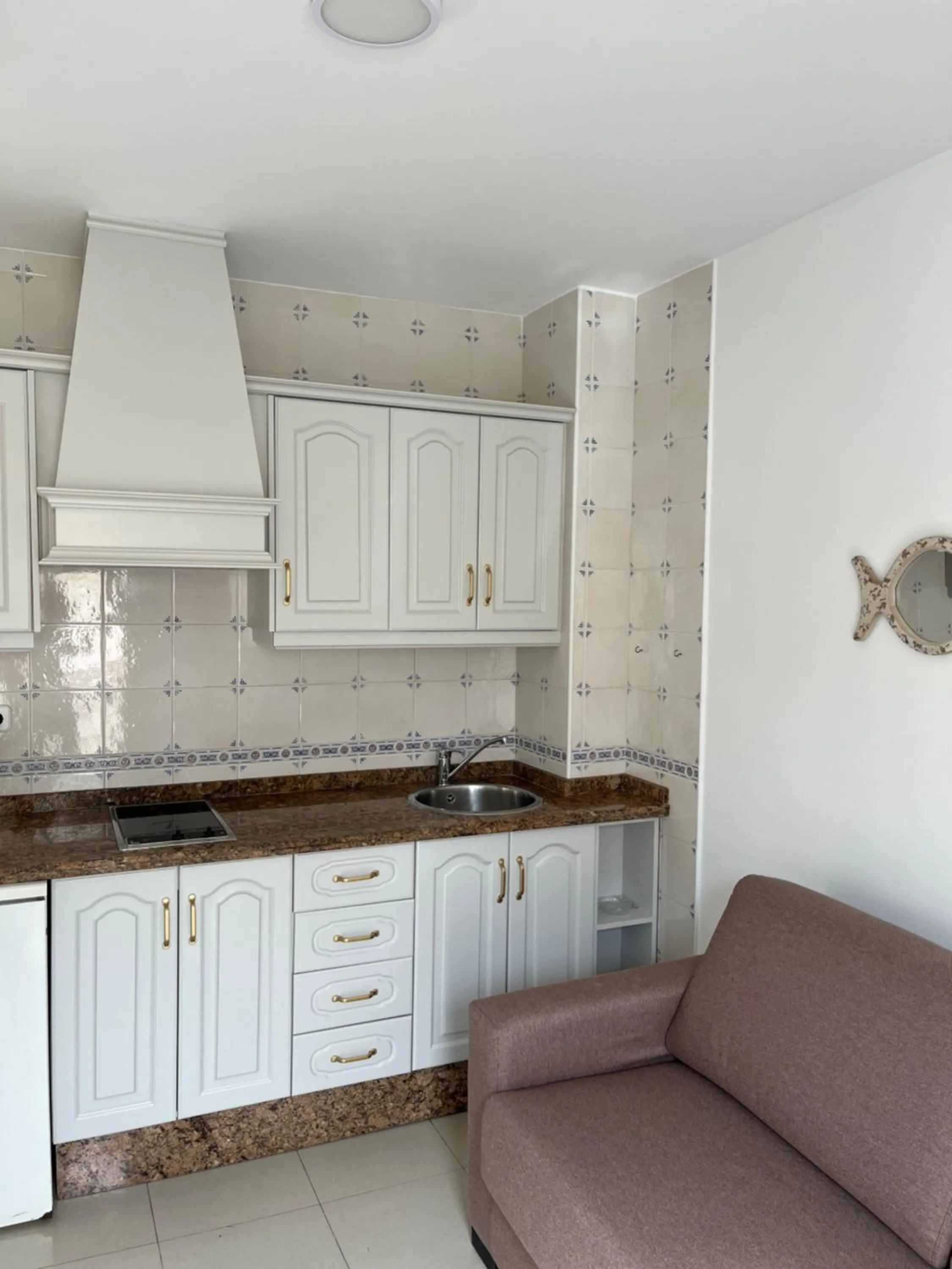 Kitchen or kitchenette in Apartamentos La Proa