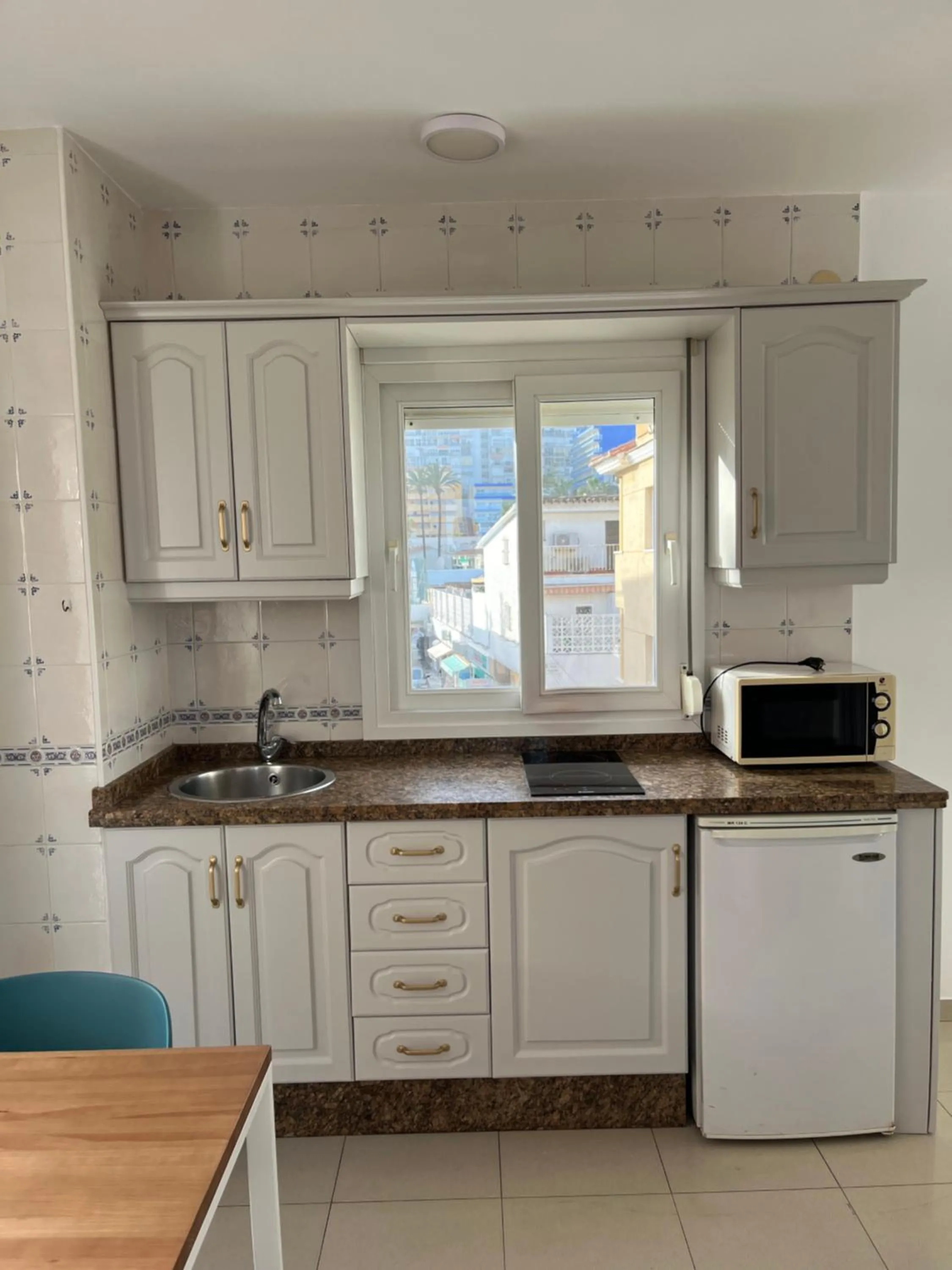 Kitchen or kitchenette in Apartamentos La Proa