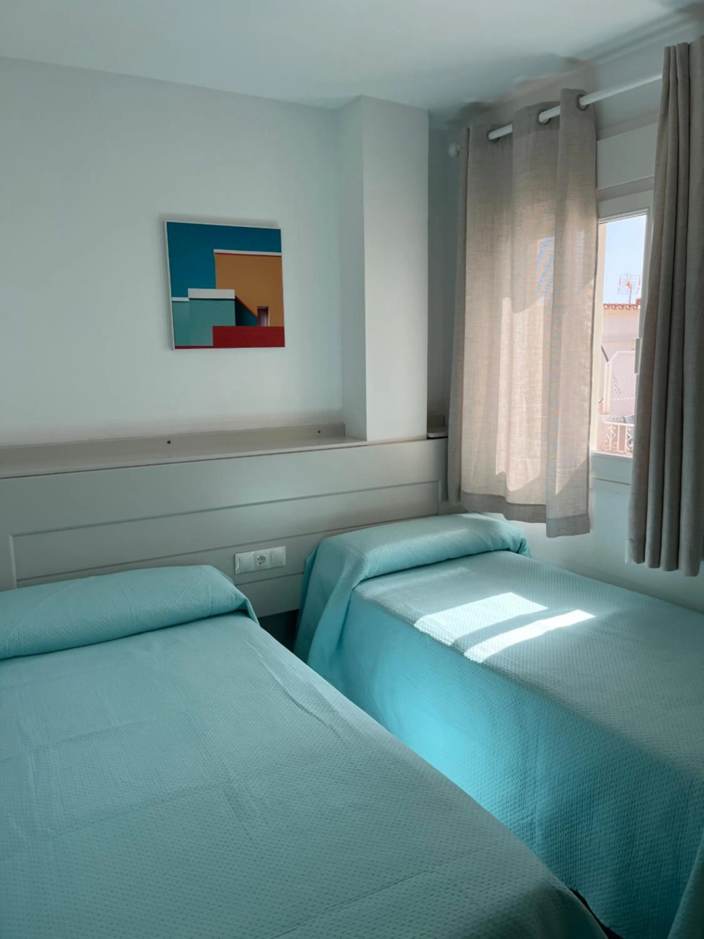 Bed in Apartamentos La Proa