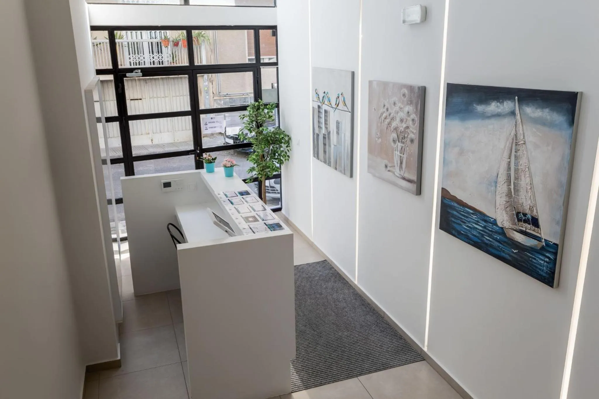 Lobby or reception in Supreme Comfort Apartments by Athens Stay