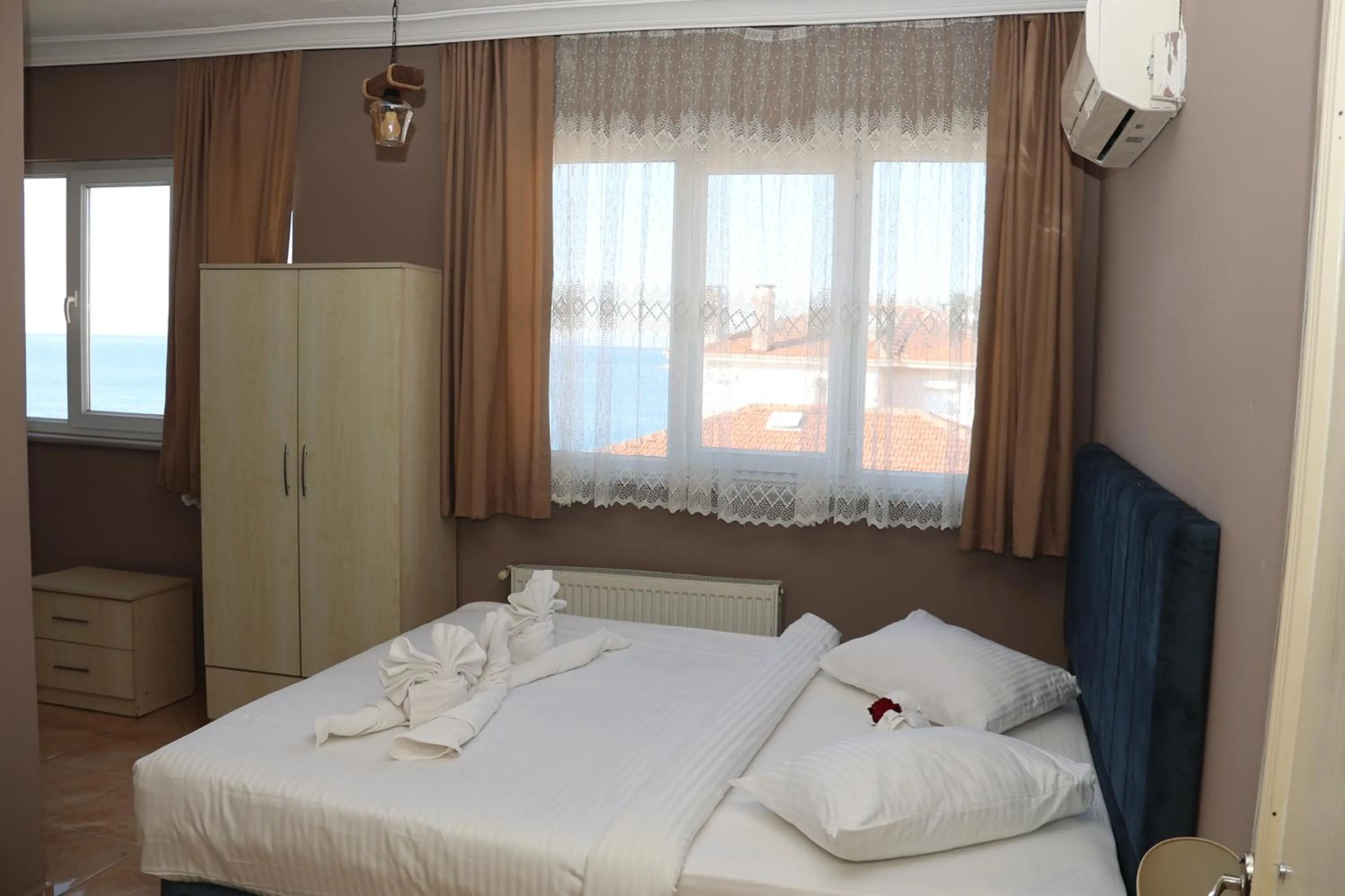 Photo of the whole room, Bed in Grand Koru Hotel Beach
