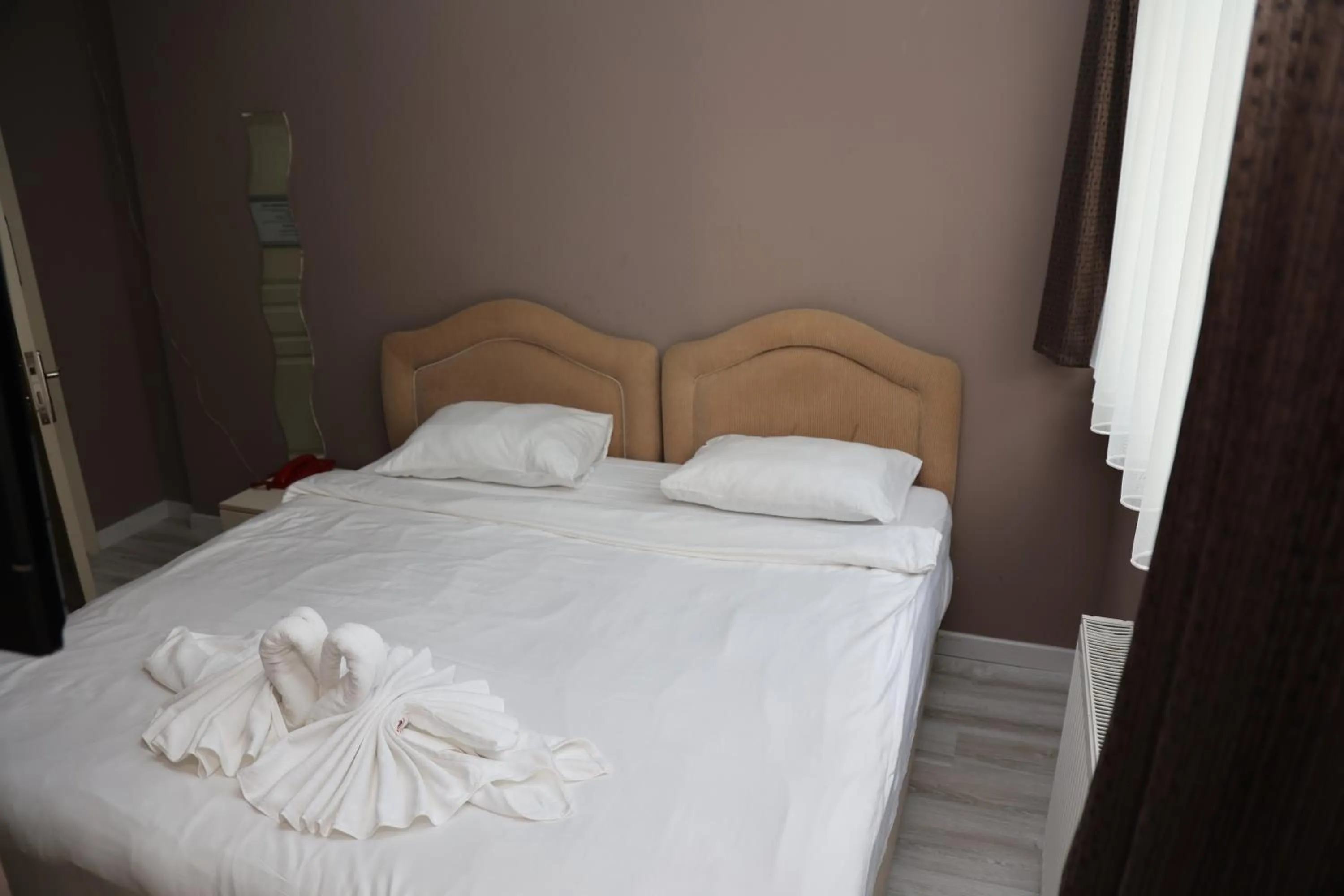 Toilet, Bed in Grand Koru Hotel Beach