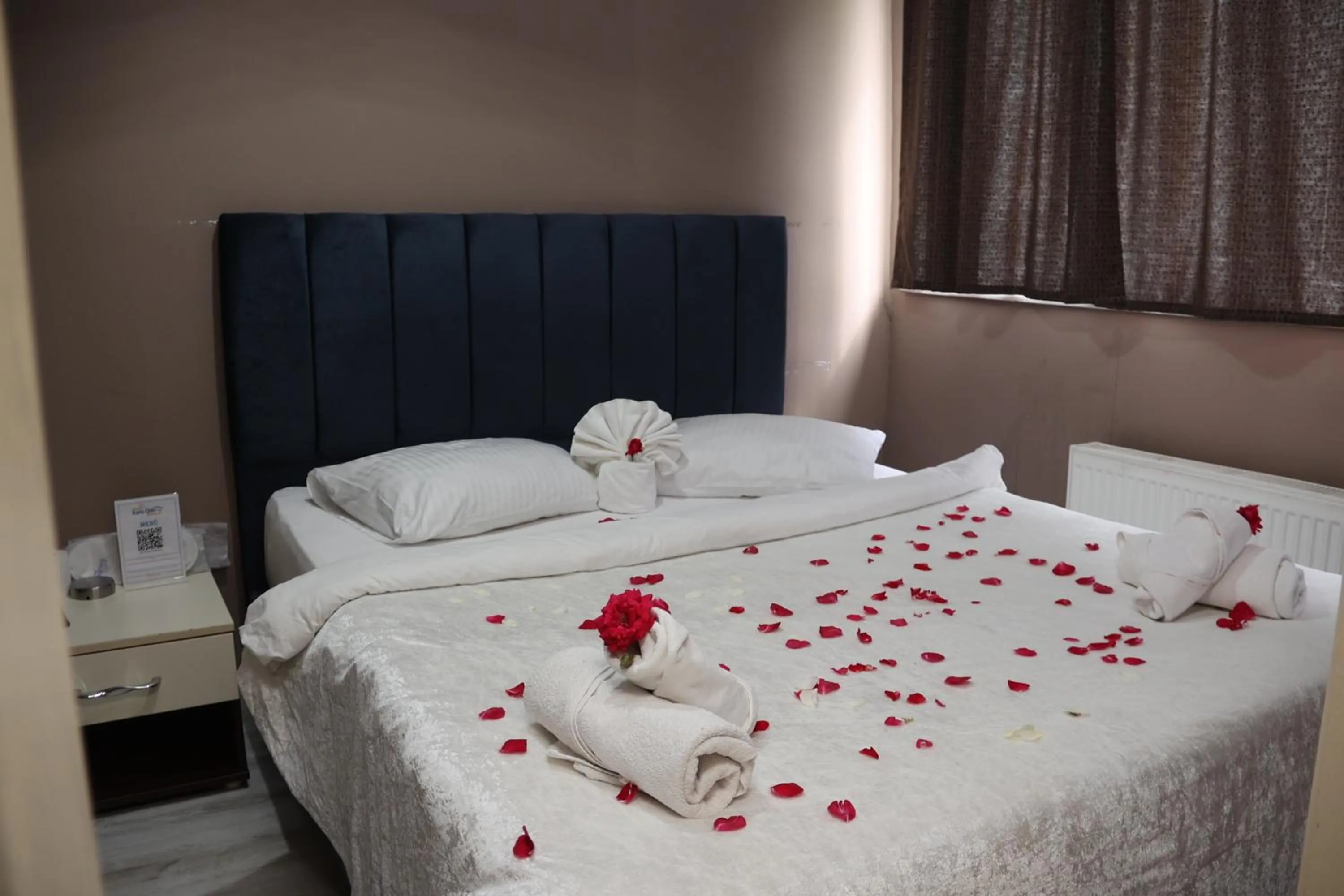 Photo of the whole room, Bed in Grand Koru Hotel Beach