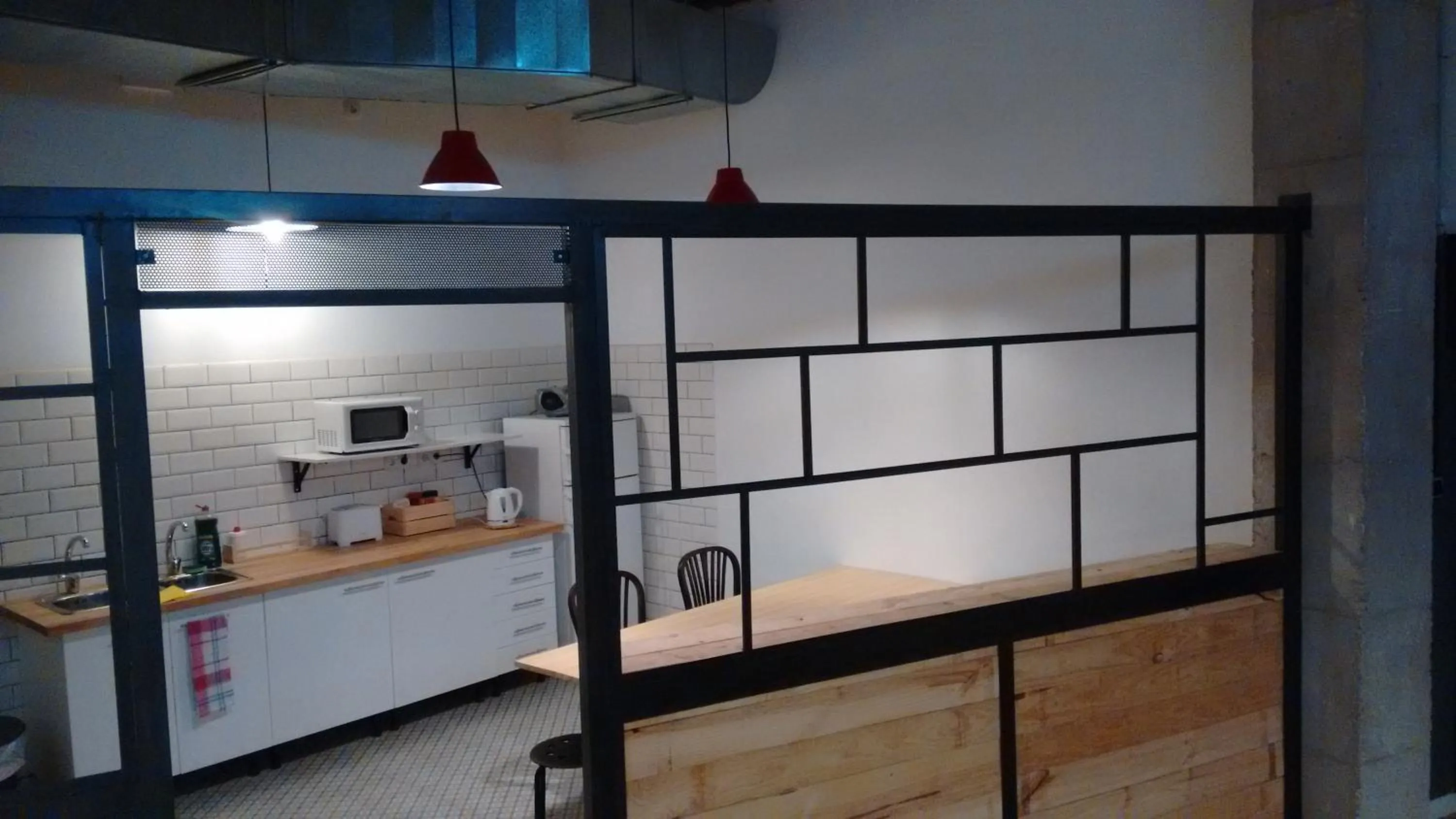 Communal kitchen in The Market Hostel